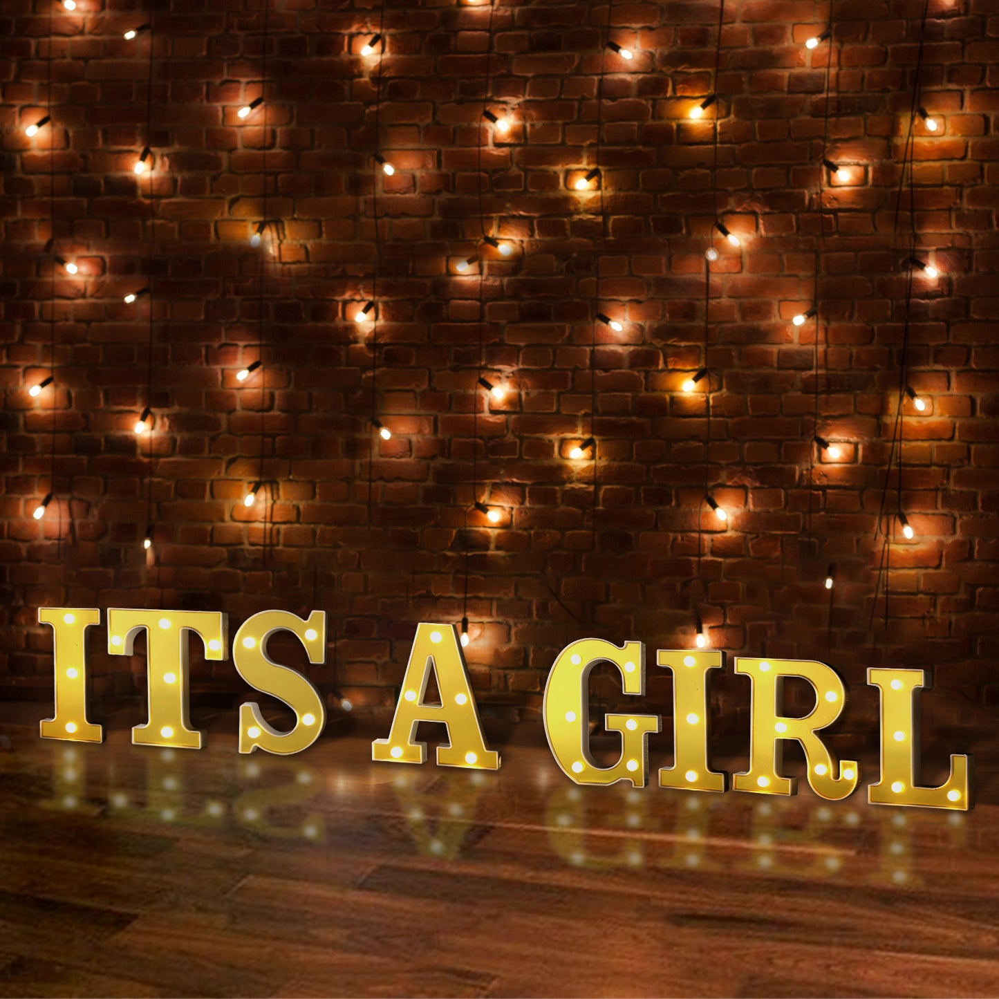 Gold 3D marquee letters illuminated with warm white lights.
