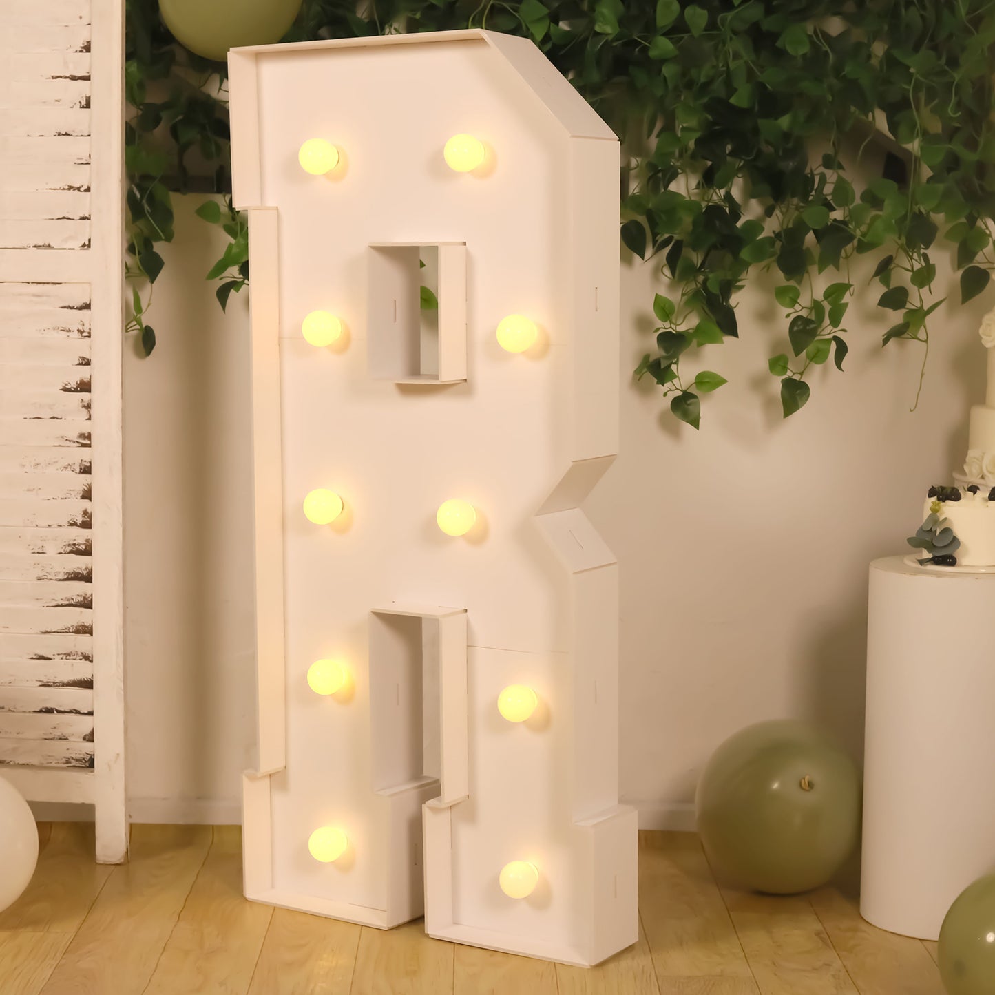 White LED marquee letter "R" with warm white lights for decoration.