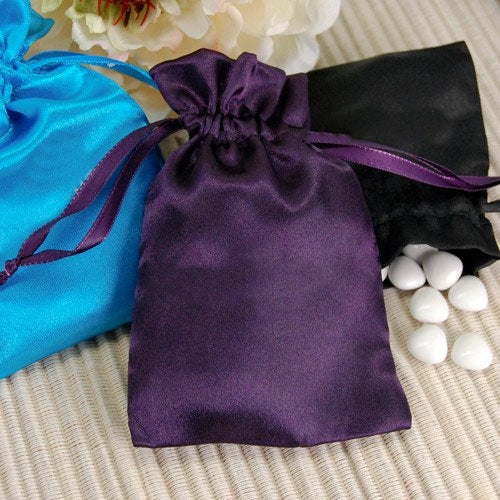 Purple satin drawstring gift bag for wedding party favors.