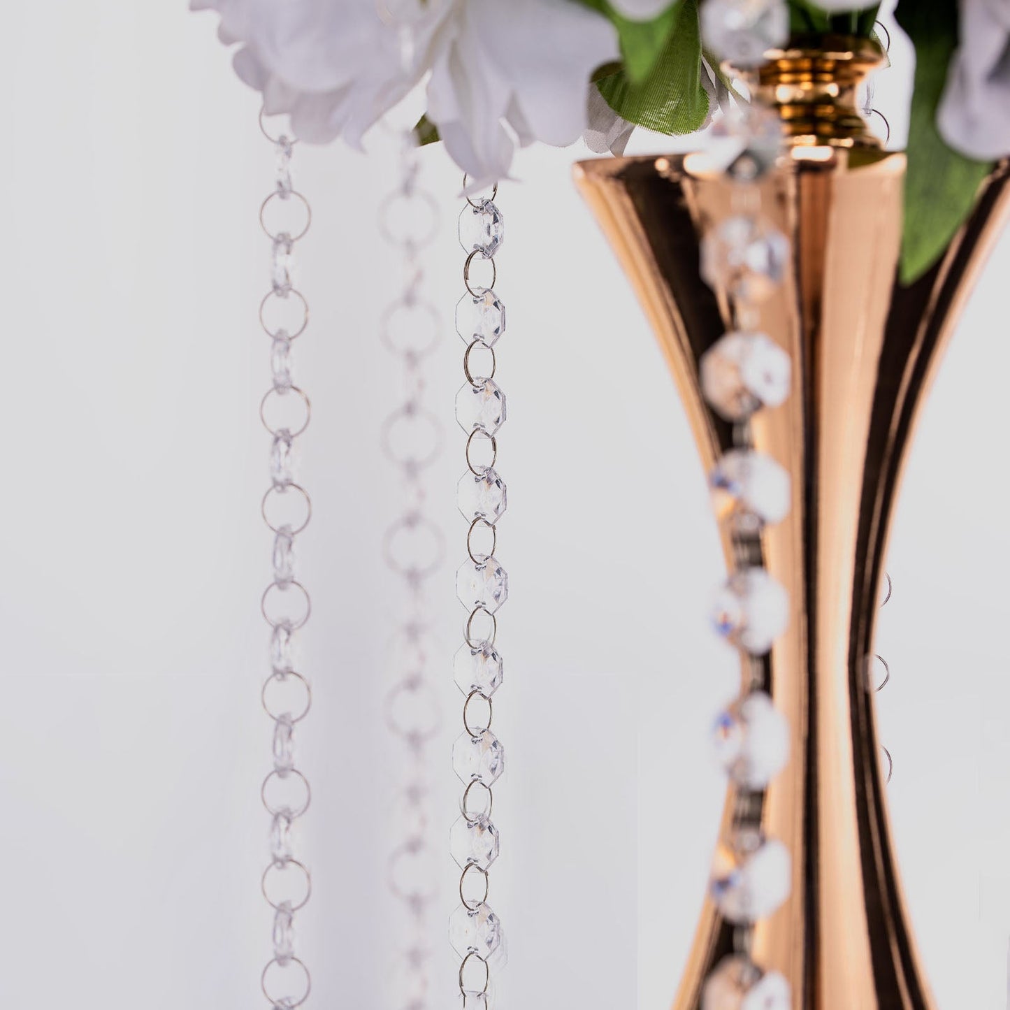Clear acrylic crystal garland strand with octagonal beads, 13 inches long.