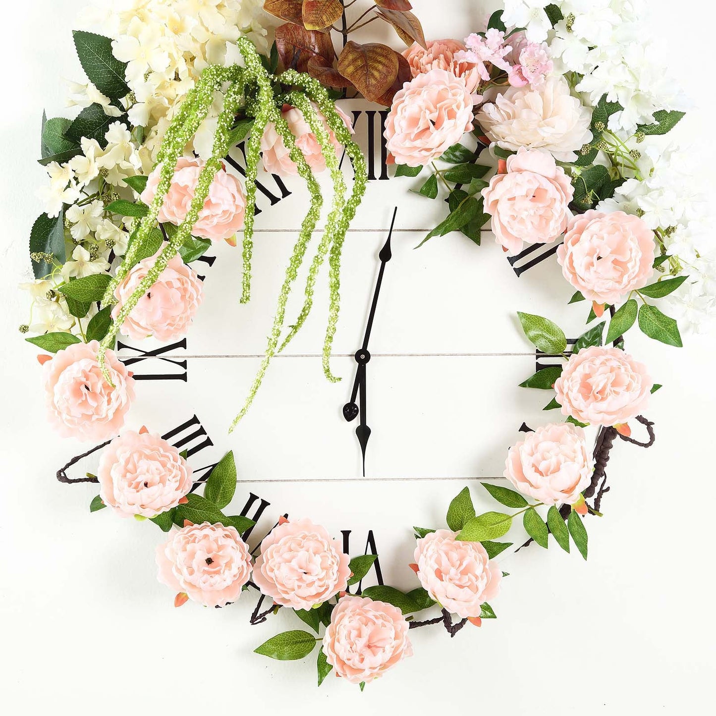 Blush artificial silk peony hanging flower garland with faux vine.