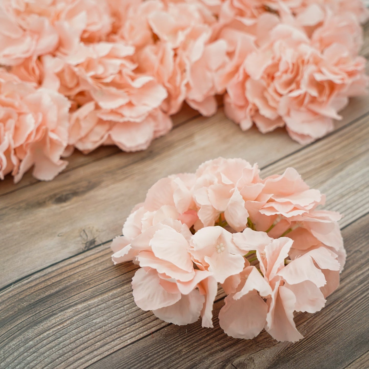 Blush artificial satin hydrangeas for DIY arrangements.