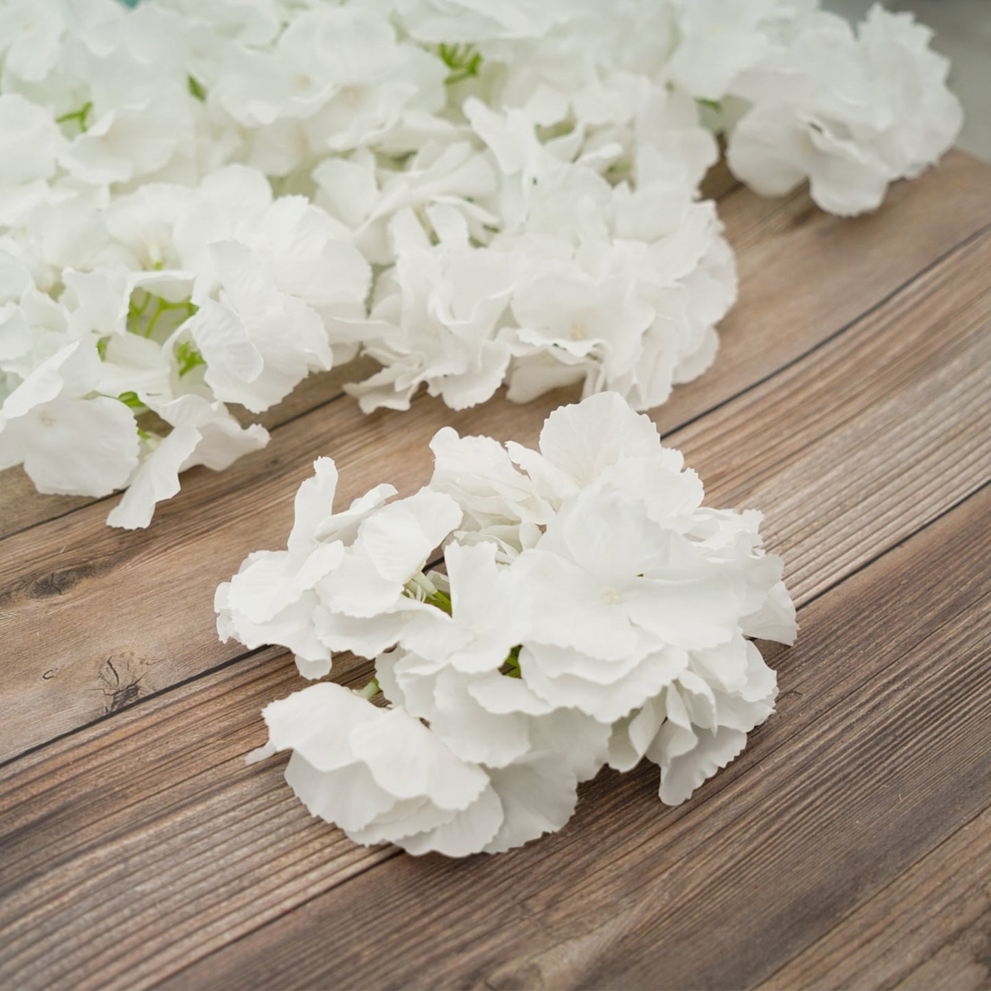 White artificial satin hydrangeas for DIY arrangements.