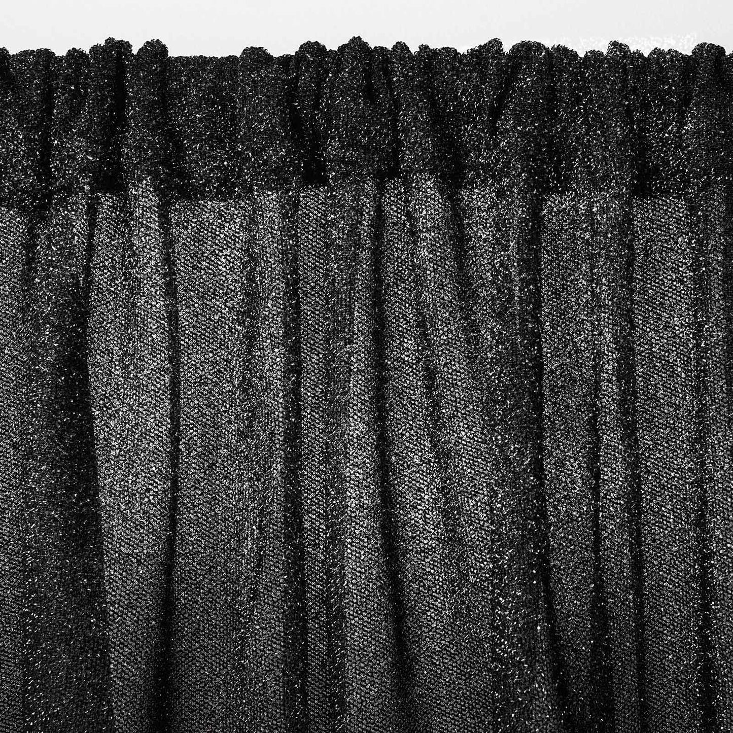 Black metallic shimmer tinsel event curtain drapes, perfect for backdrops.