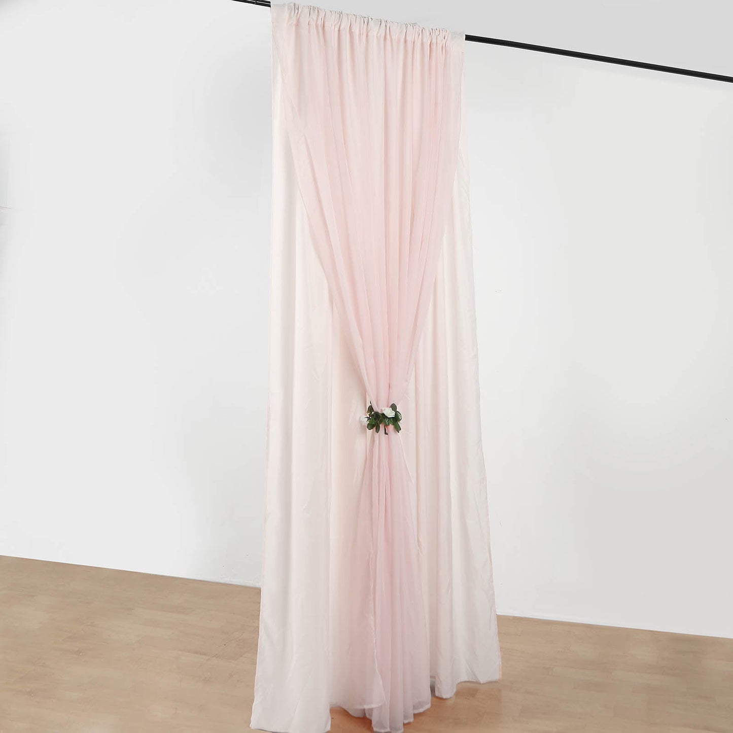 Blush chiffon polyester event curtain drapes in dual layer design.