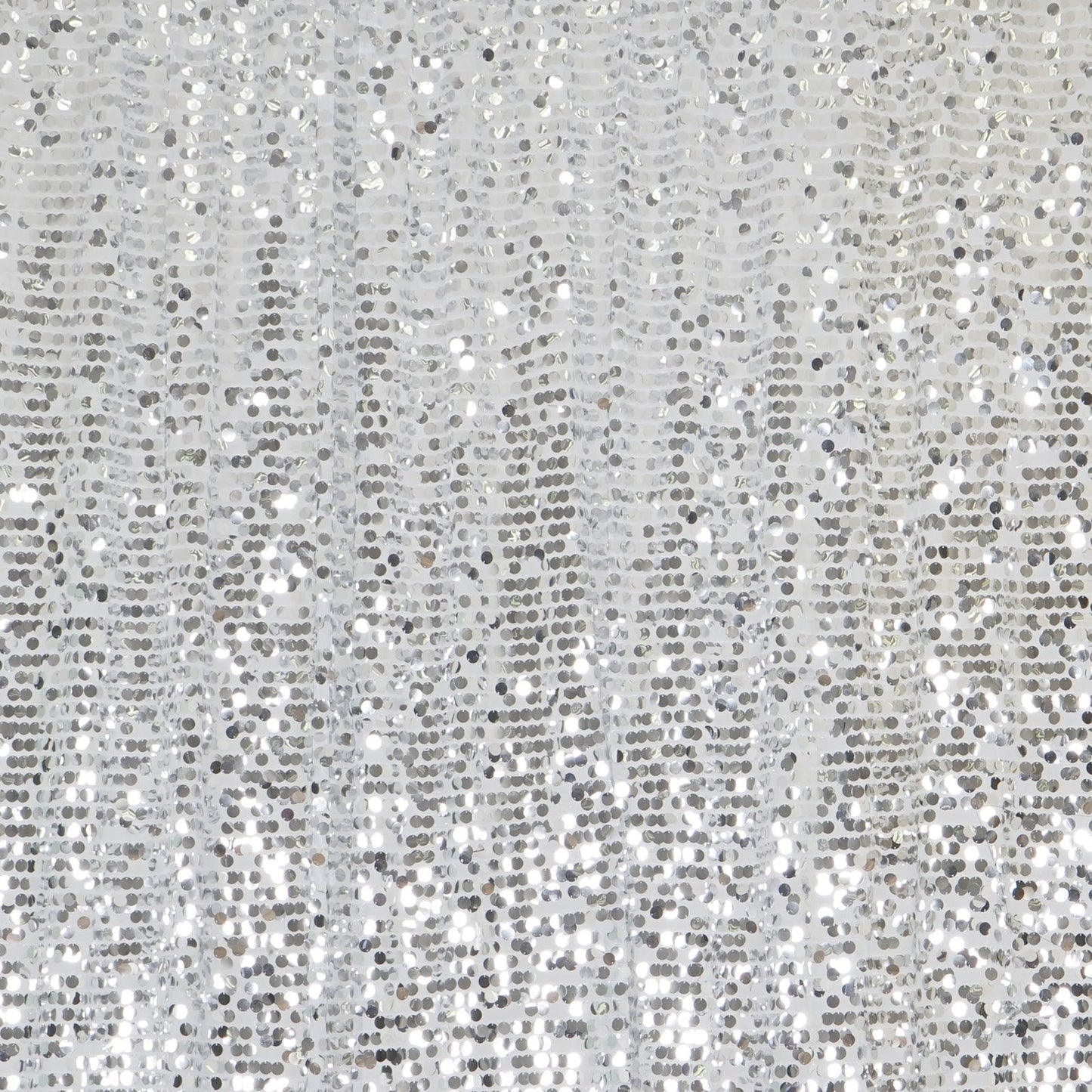 Silver sequin event curtain drapes, perfect for backdrops and decorations.
