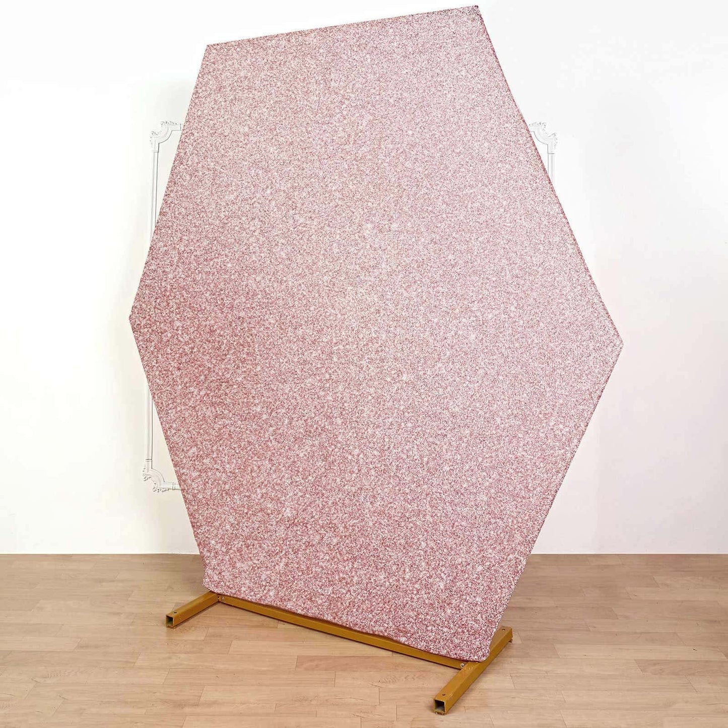 Rose gold metallic shimmer hexagon backdrop for weddings.