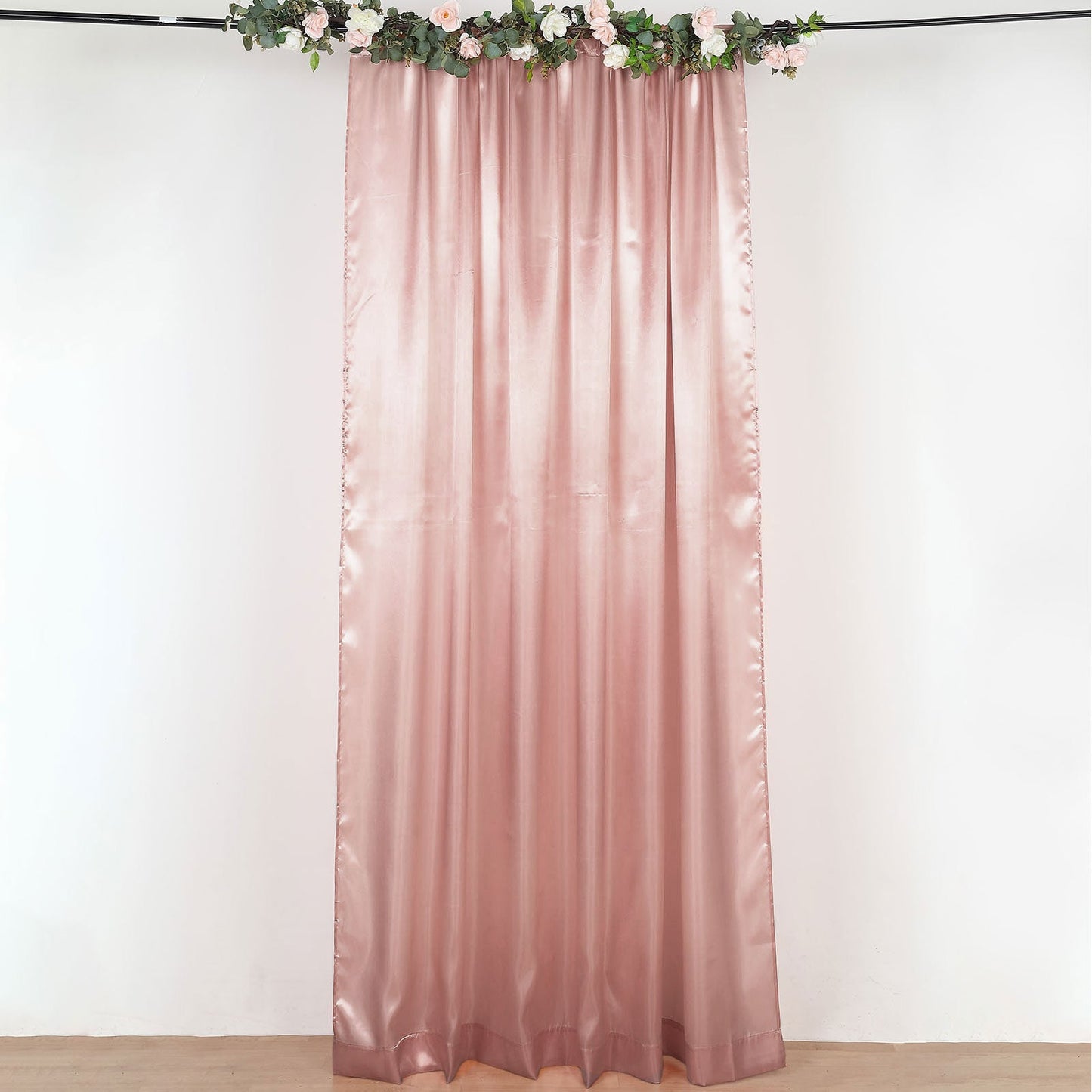 Dusty rose satin event curtain drapes, perfect for stylish backdrops.