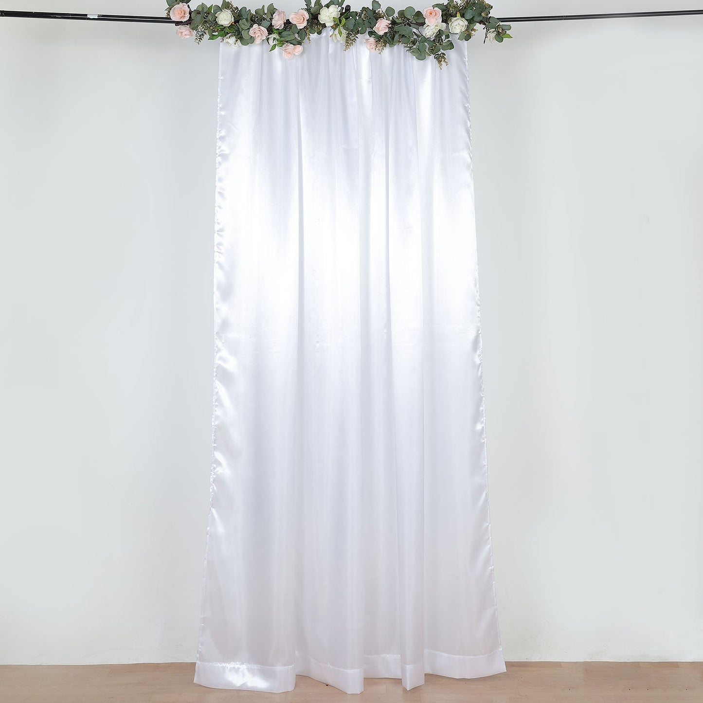 White satin event curtain drapes, perfect for backdrops and decorations.