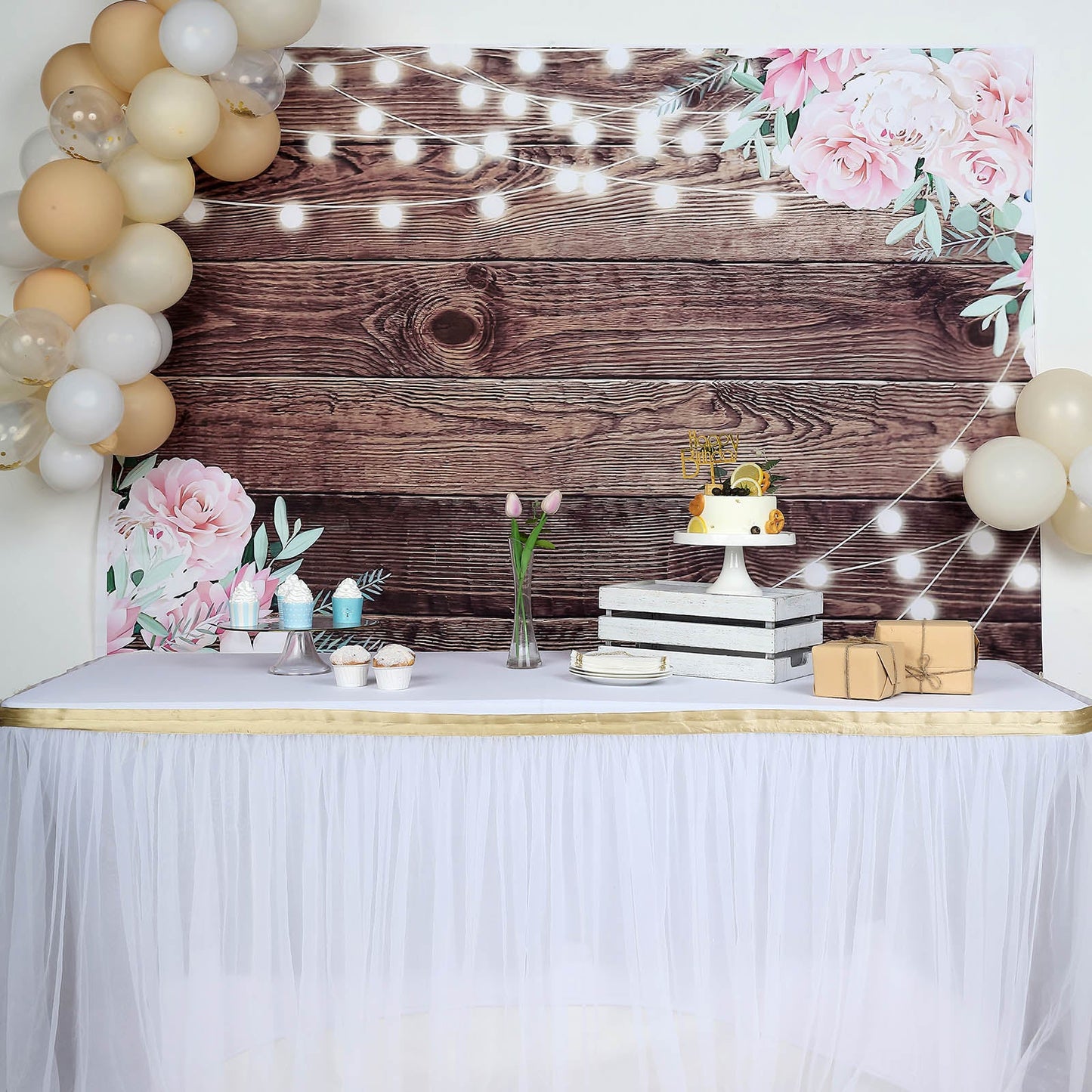 Rustic wood backdrop with string lights and floral accents.