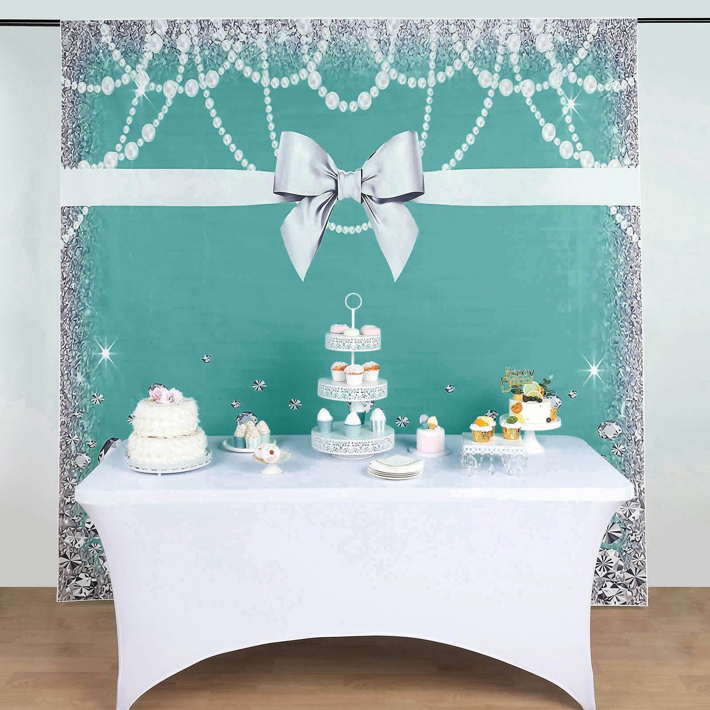Turquoise and white bow vinyl backdrop with diamond pearl print.