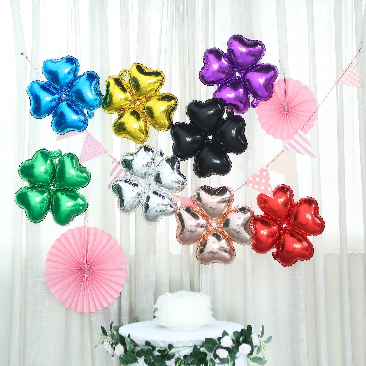 Shiny green four leaf clover shaped mylar foil balloons, 15 inches, 10 pack.