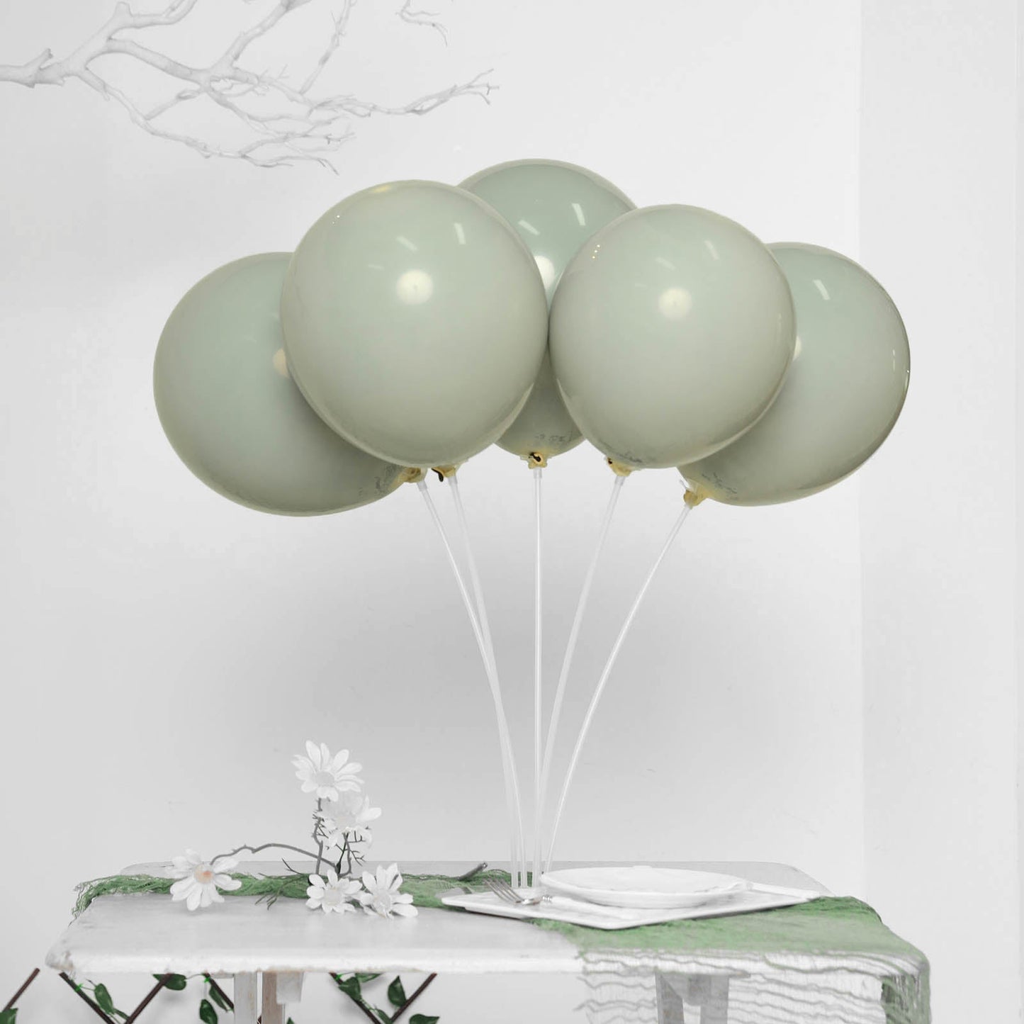 Matte gray double stuffed party balloons on display.