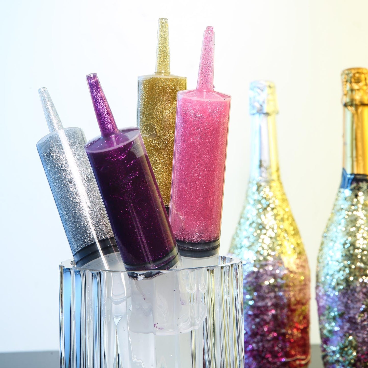 Metallic purple glitter glue for arts and crafts, DIY sensory bottle.