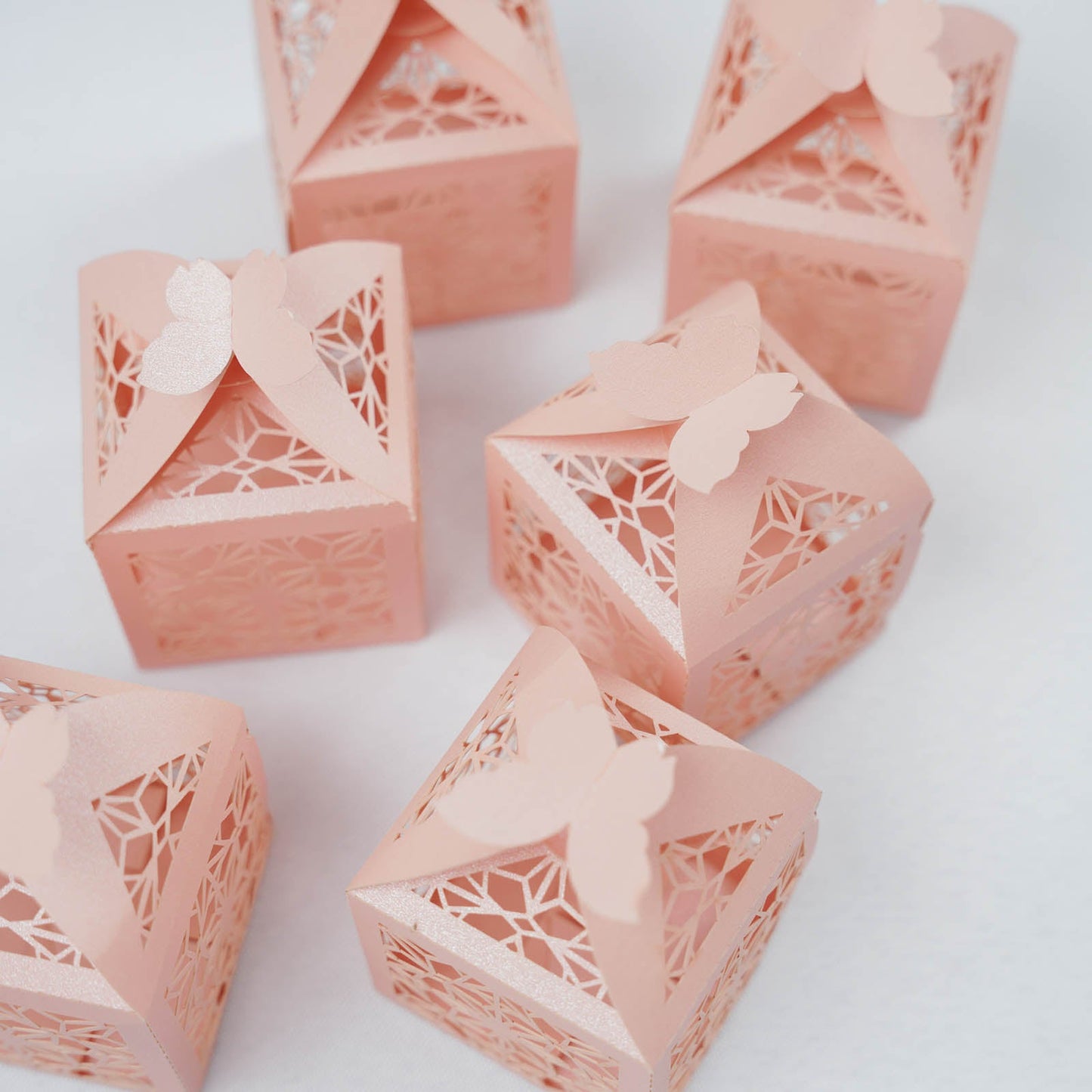 Blush butterfly top laser cut favor candy gift boxes in a 25 pack.