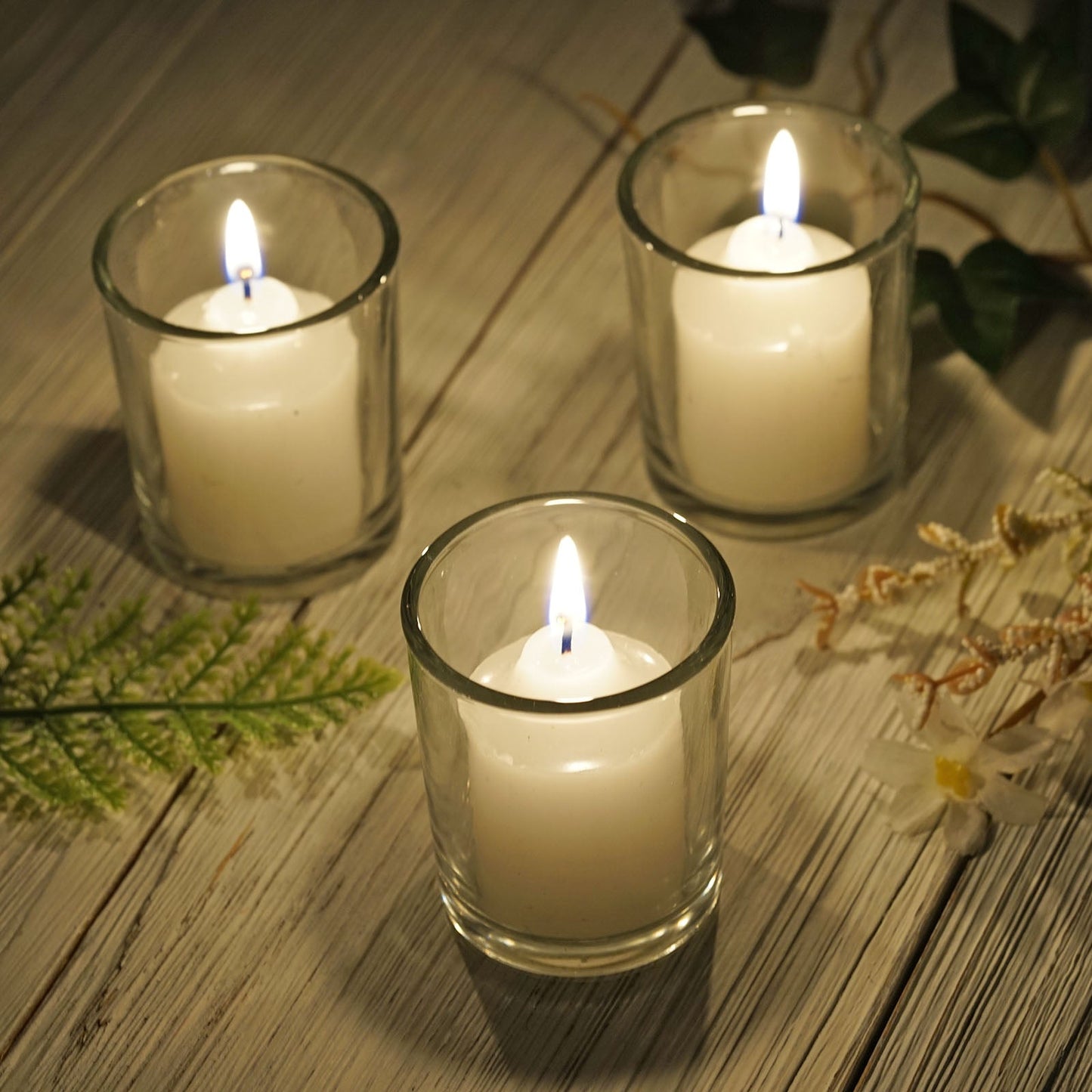 Clear glass votive candle holders with tealights, set of 12.