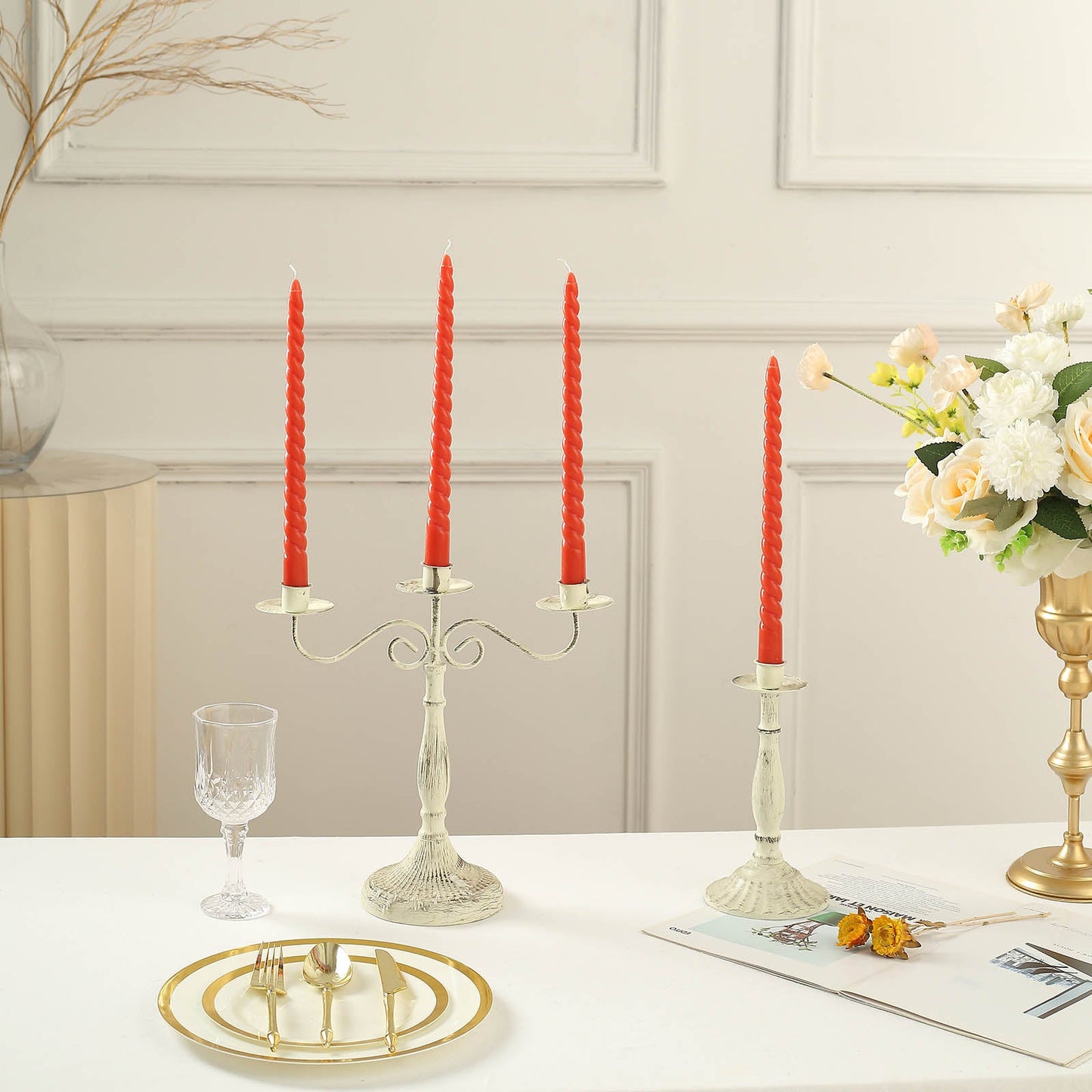 11" Rust Premium Unscented Spiral Wax Taper Candles on a decorative table setting.