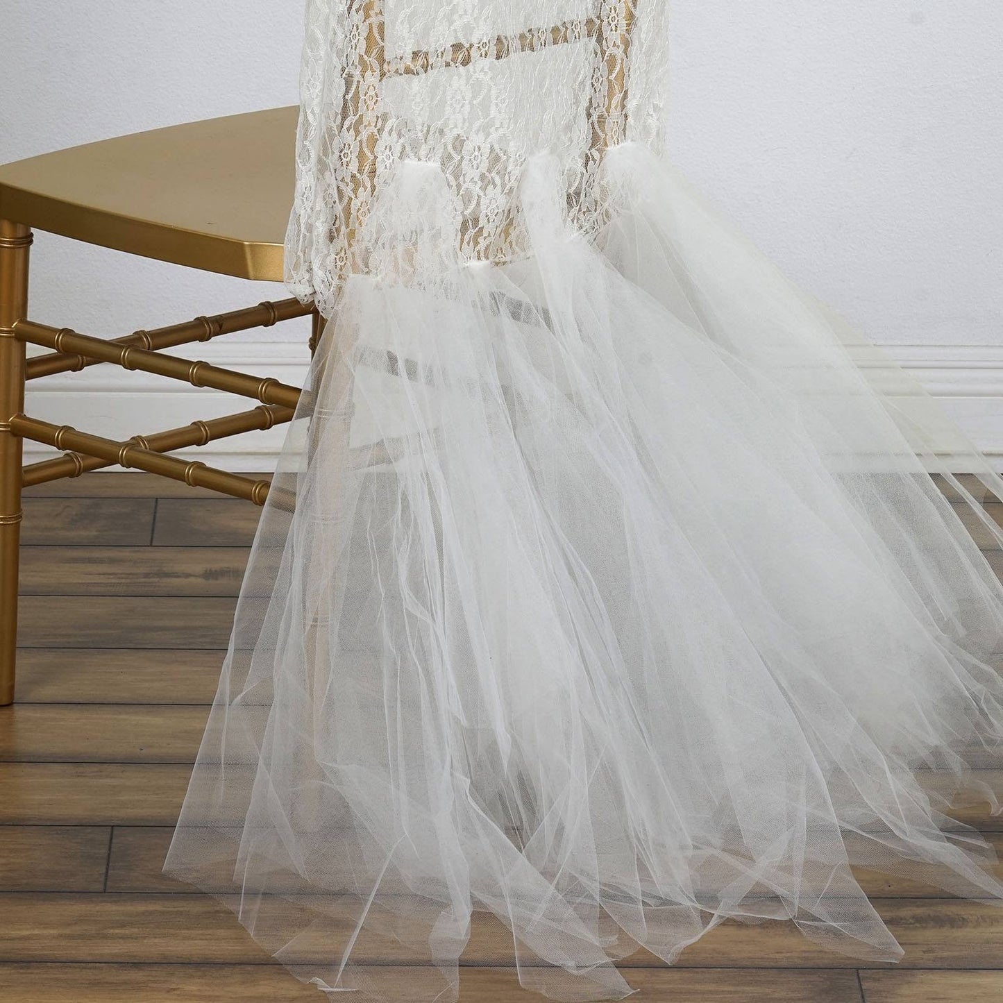 Ivory lace and tulle chair tutu cover skirt for wedding decor.
