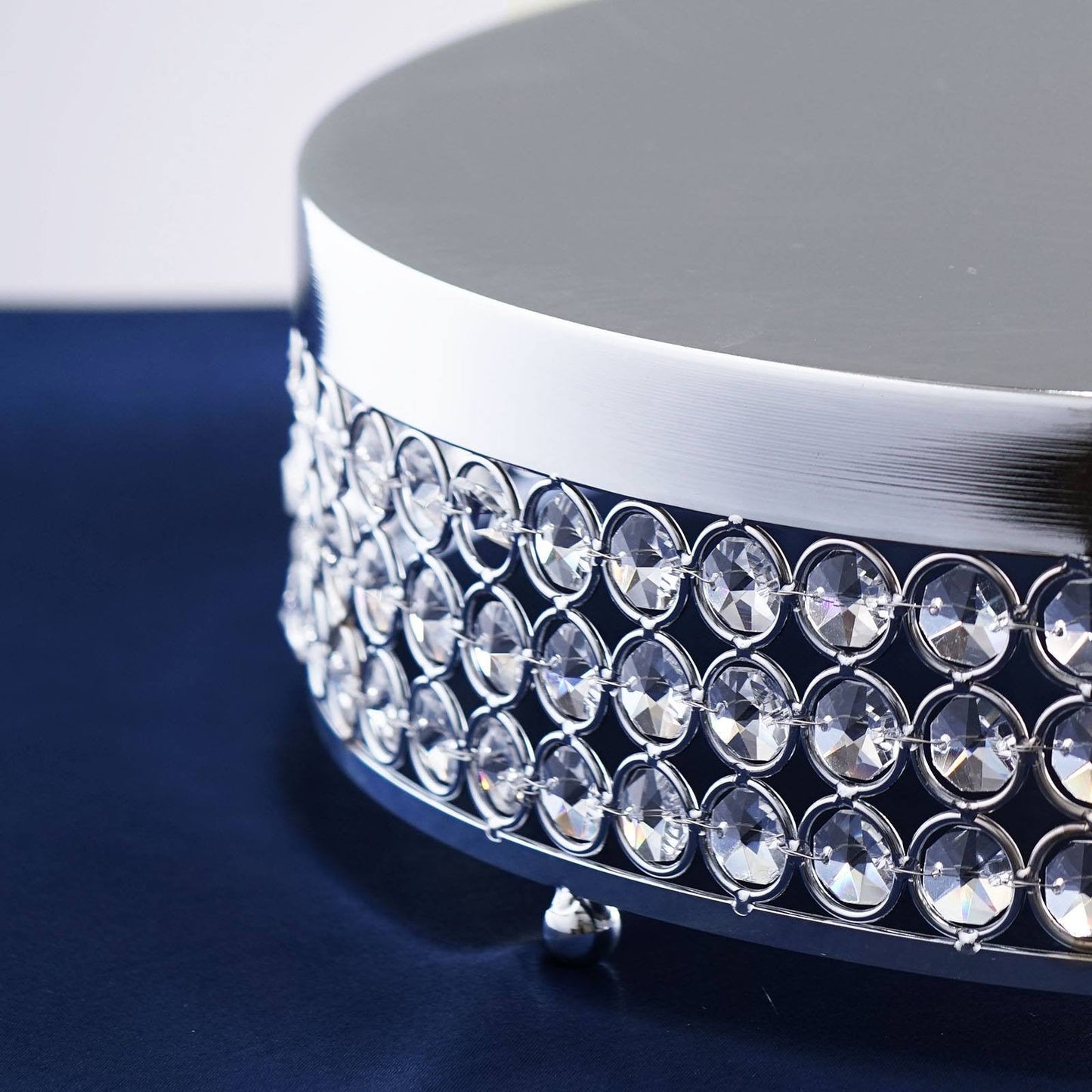 Silver crystal beaded metal cake stand pedestal for dessert display.