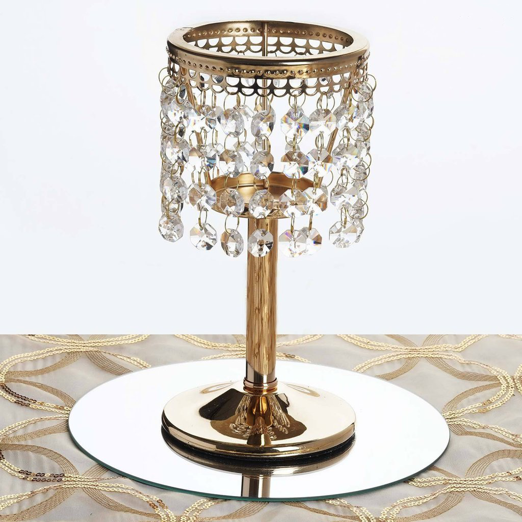 Gold crystal beaded chandelier votive candle holder on a mirrored base.