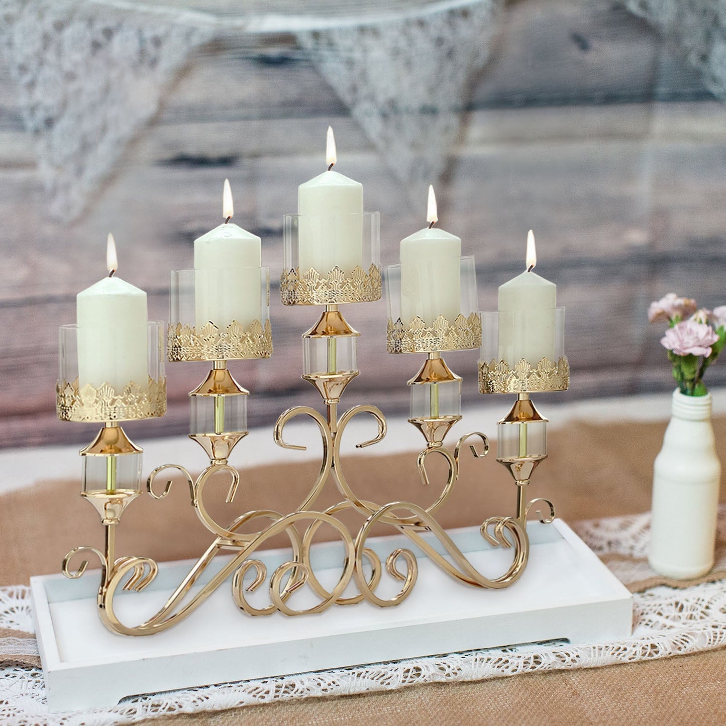 Antique gold metal 5 arm candle candelabra centerpiece with hurricane glass holders.