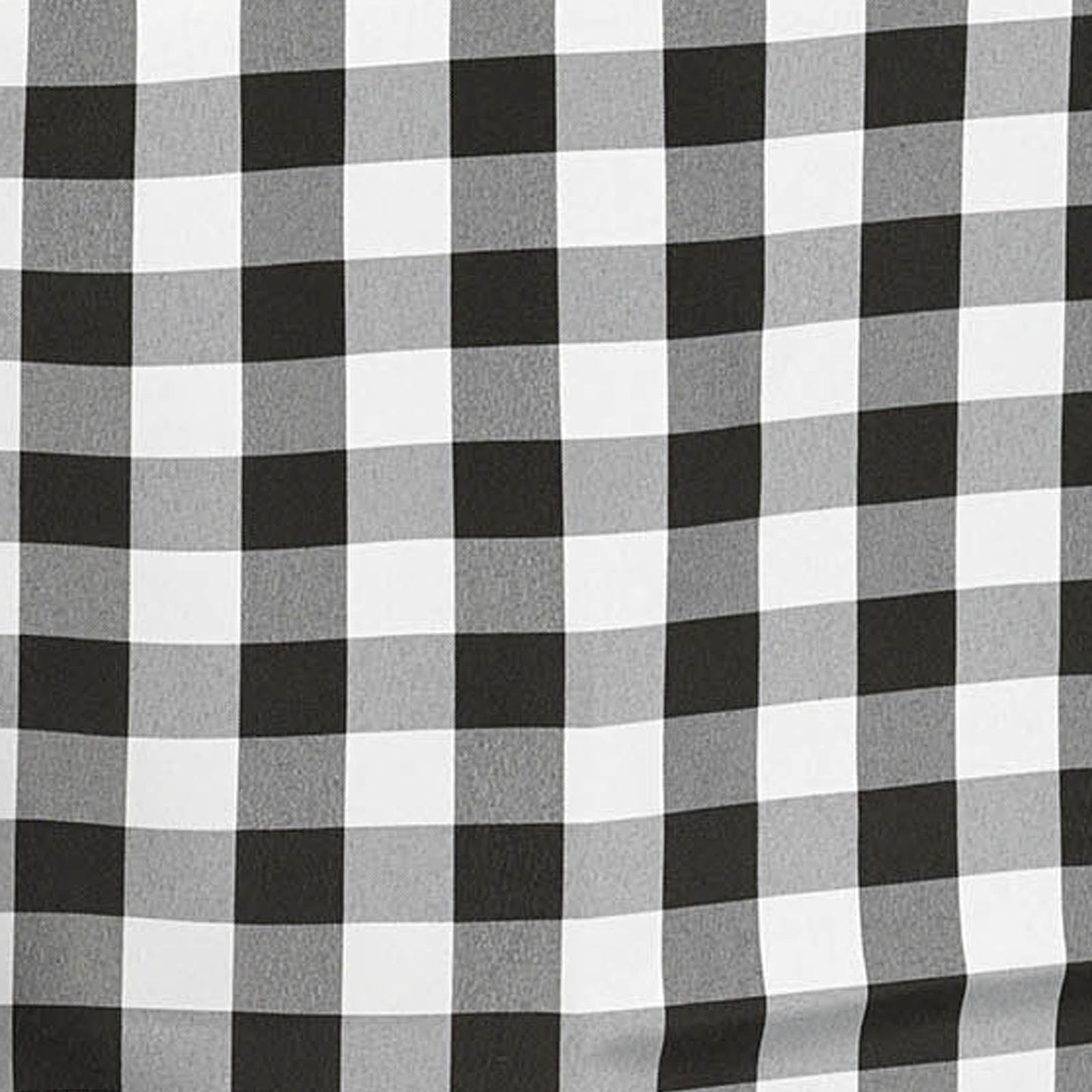 White and black checkered tablecloth for dining or events.