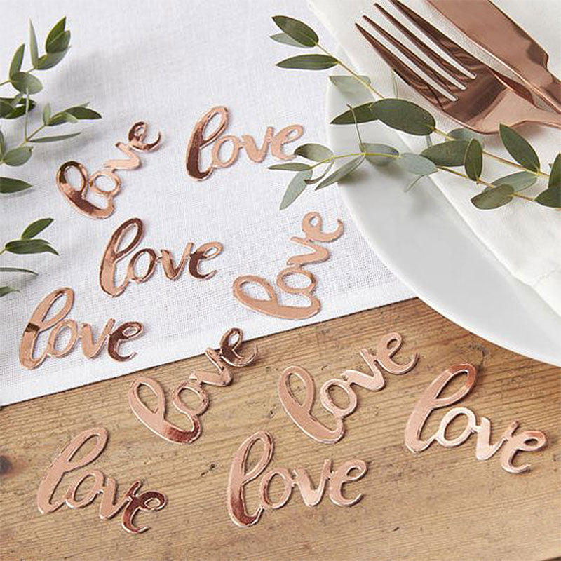 Rose gold love table confetti sprinkles for party decor.