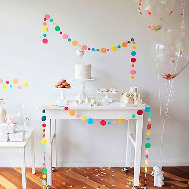 Pink metallic foil baby shower table confetti sprinkles for festive celebrations.