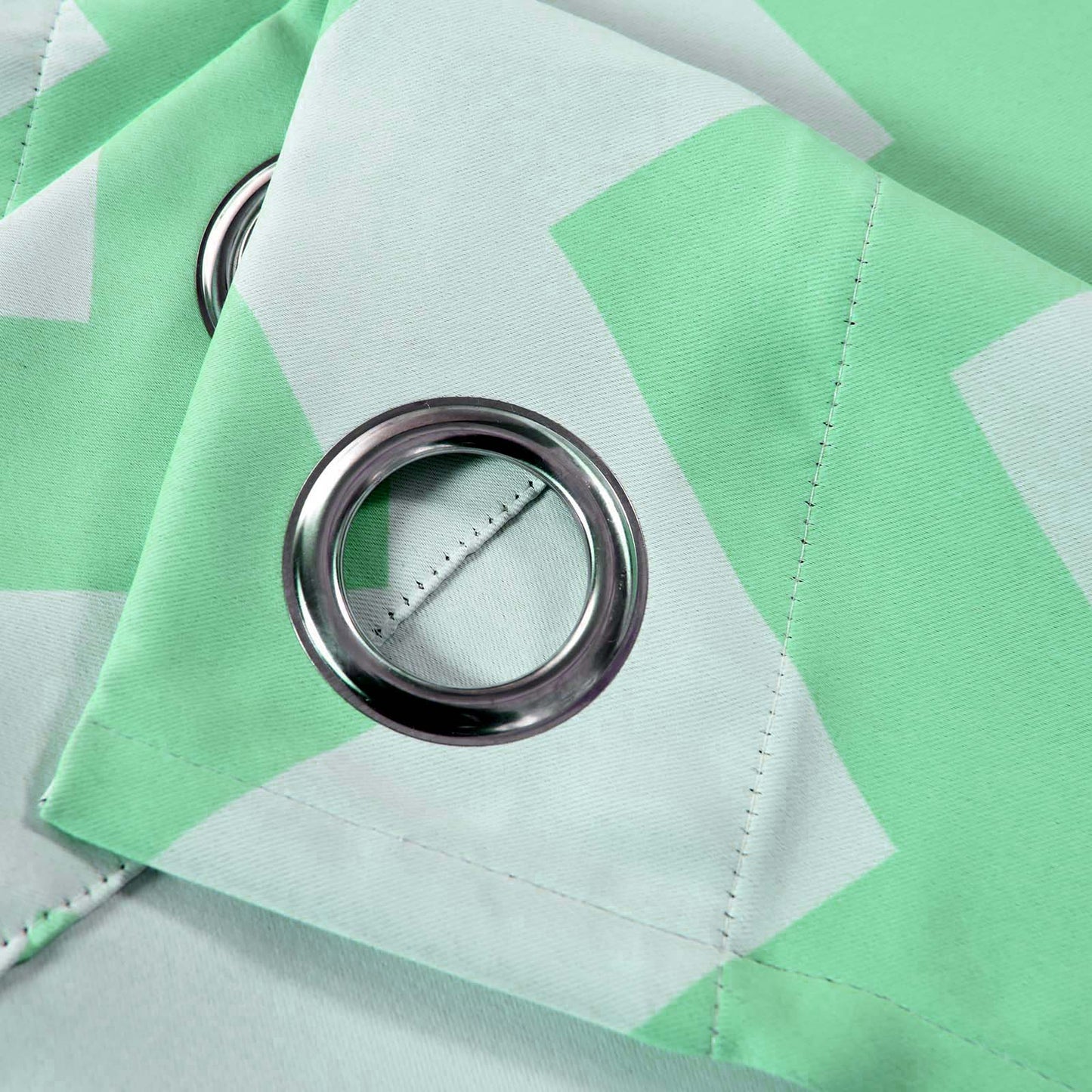 White and mint chevron print blackout curtain panel with grommets.