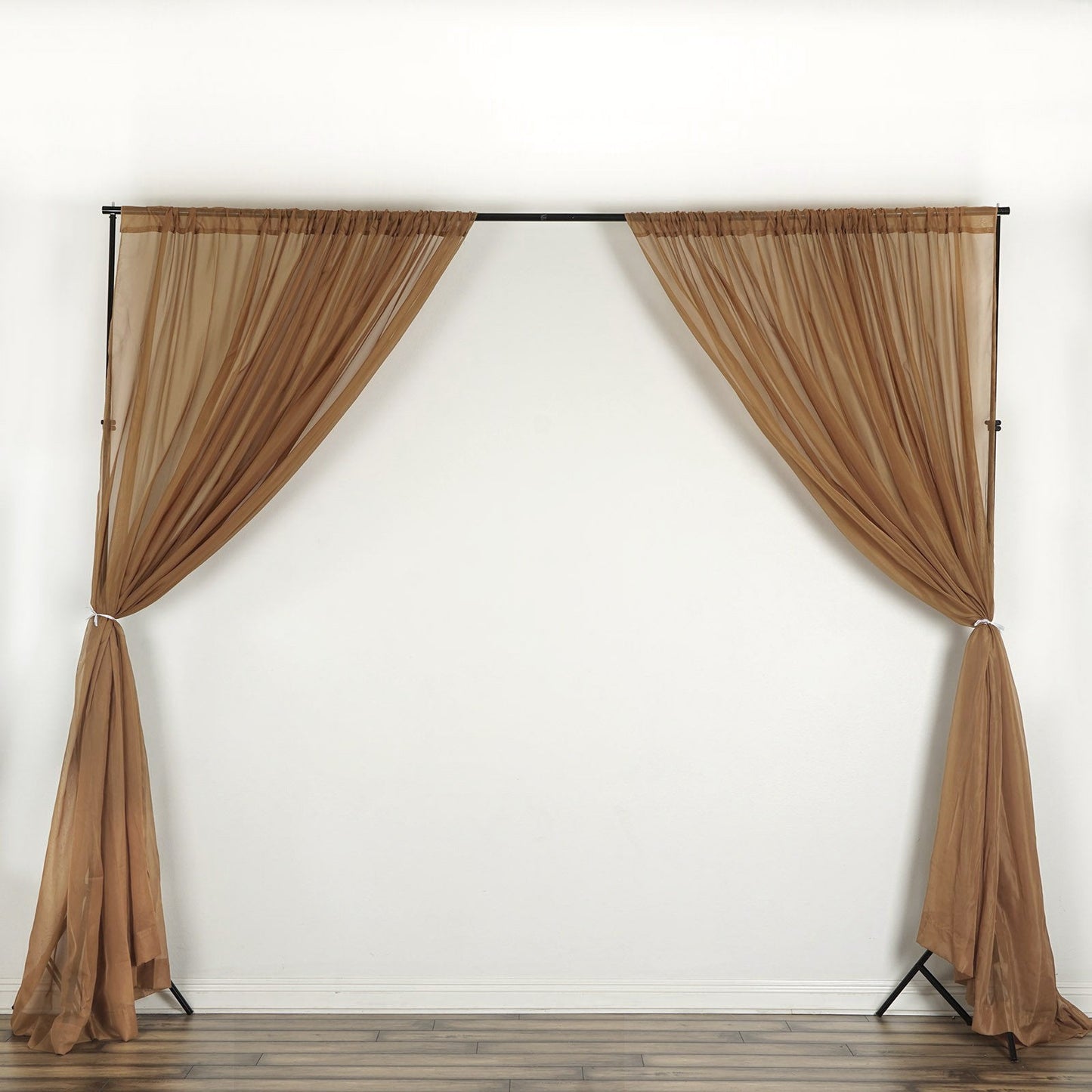 Gold chiffon backdrop drape curtains for events, flame resistant sheer panels.