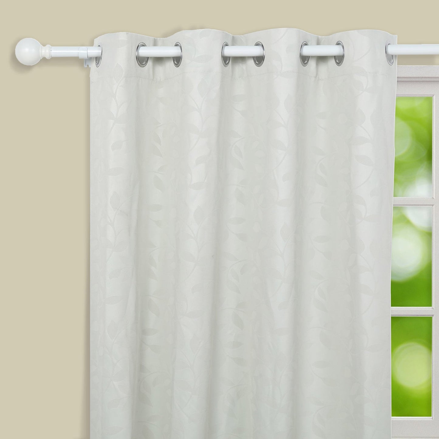White adjustable curtain rod set with round finials.