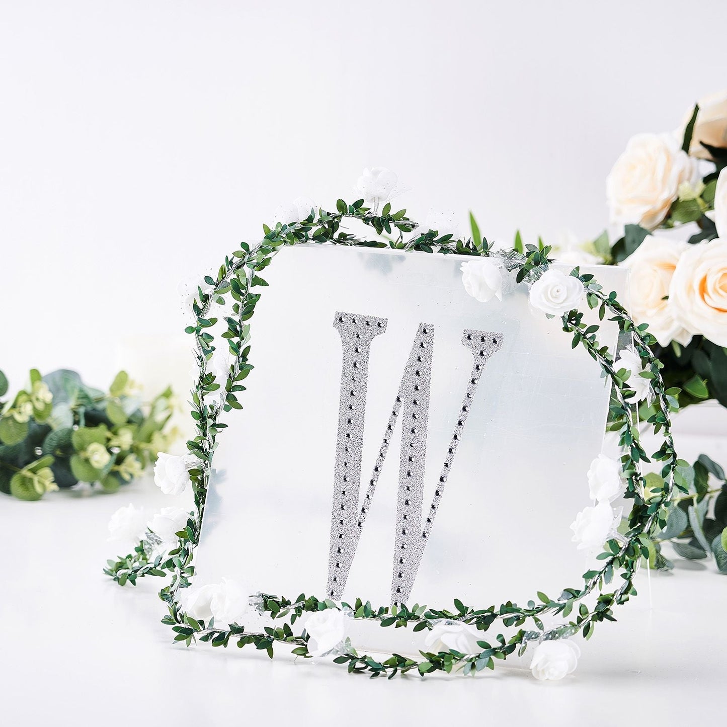 Silver decorative rhinestone letter sticker "W" for DIY crafts.