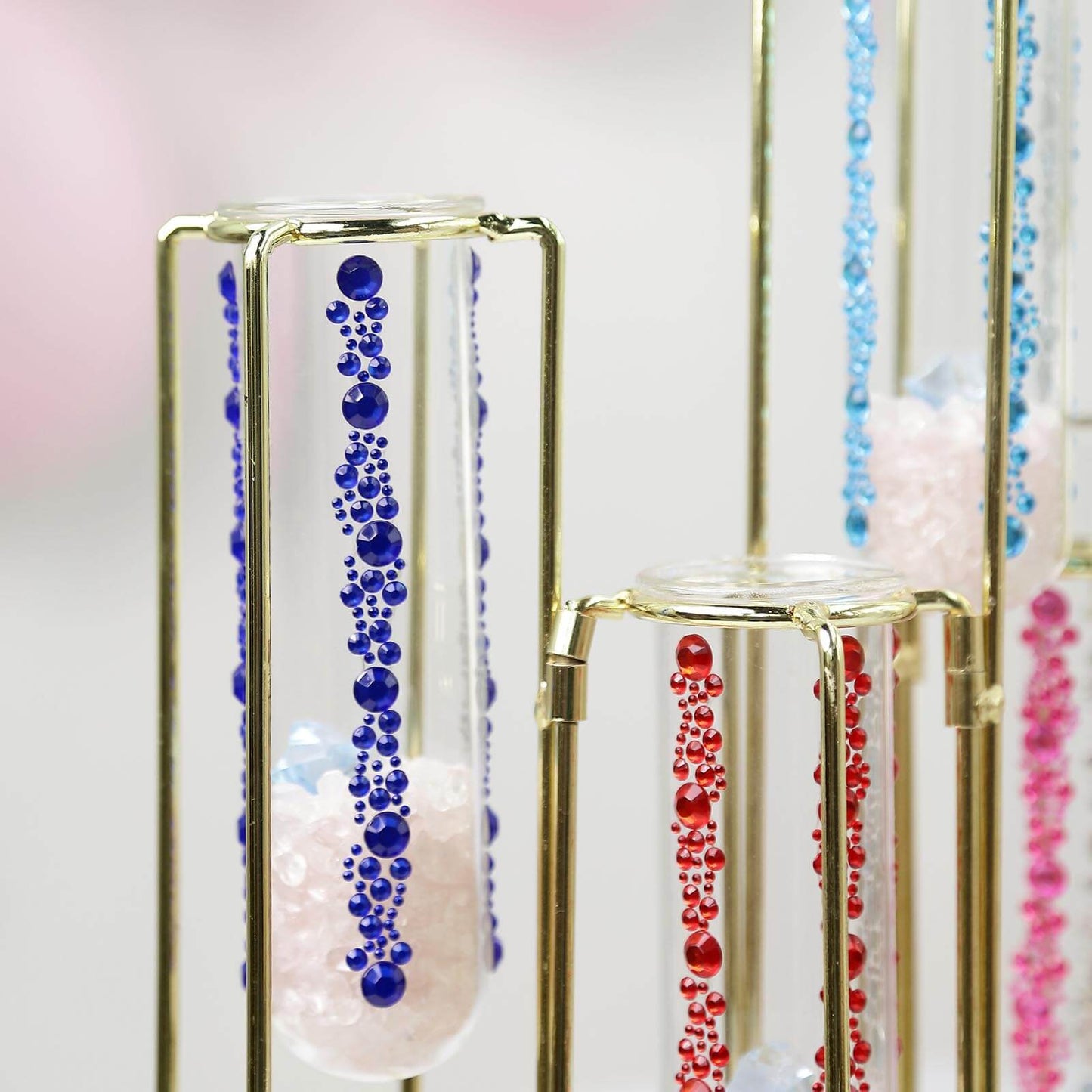 Lavender rhinestone trim strips in a decorative display.