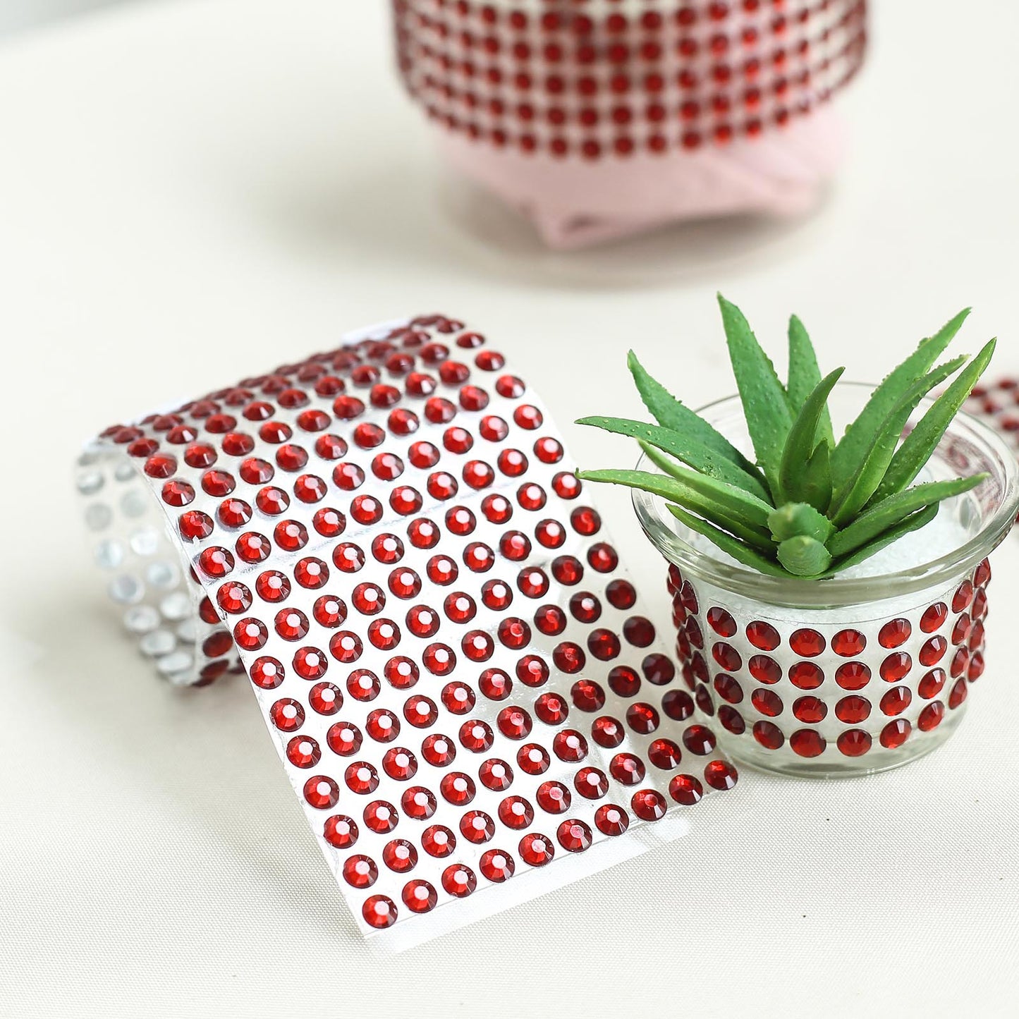 Red self-adhesive rhinestone sticker wrap sheets for DIY crafts.