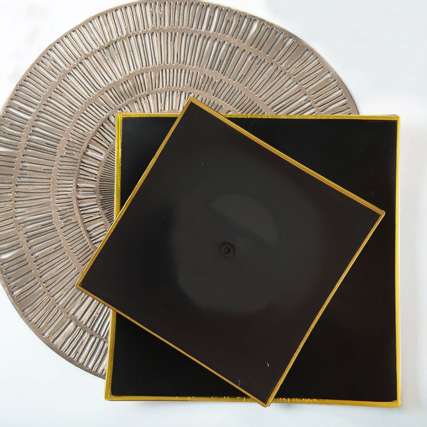 Black and gold modern square plastic dessert plates.