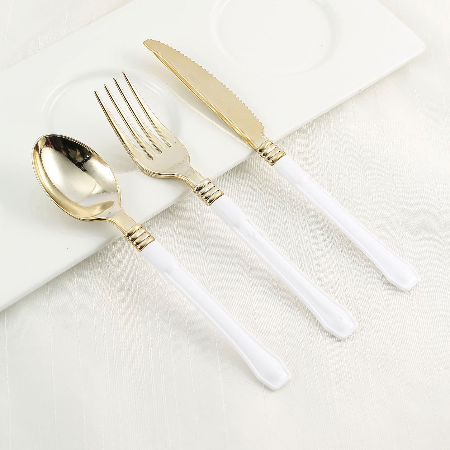 Gold plastic forks with white handles, heavy duty, 24 pack.