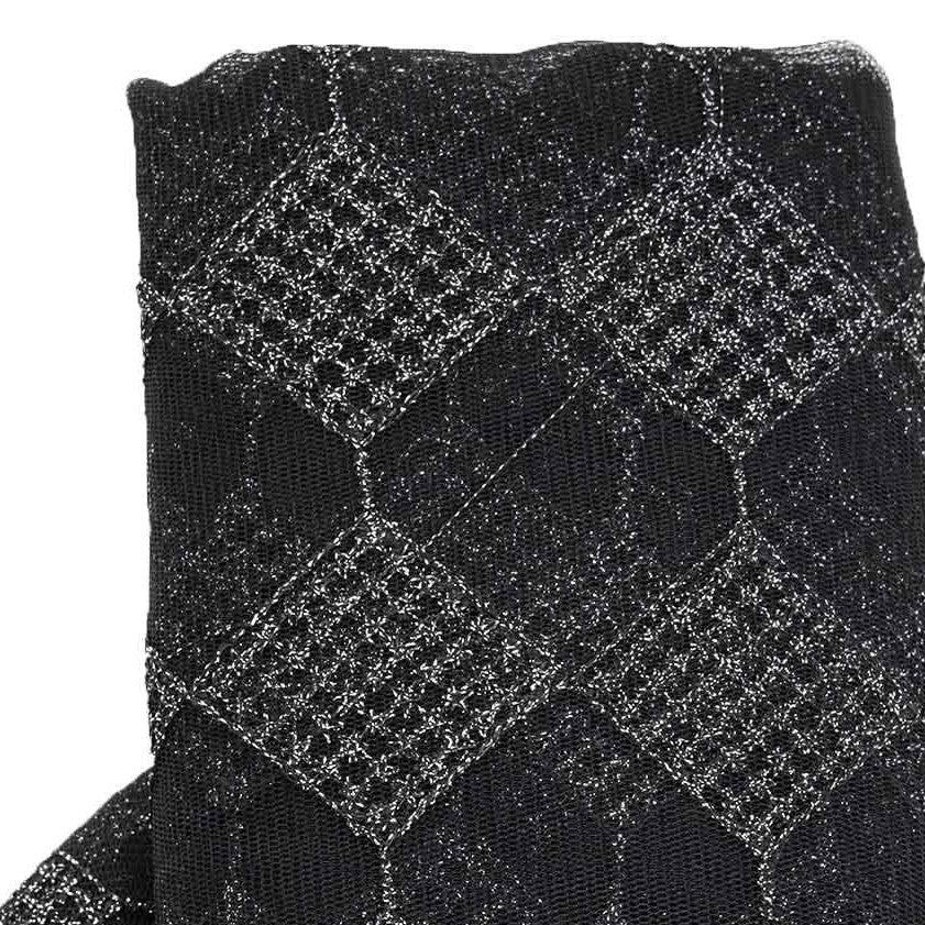 Black and silver buffalo plaid polyester fabric roll.