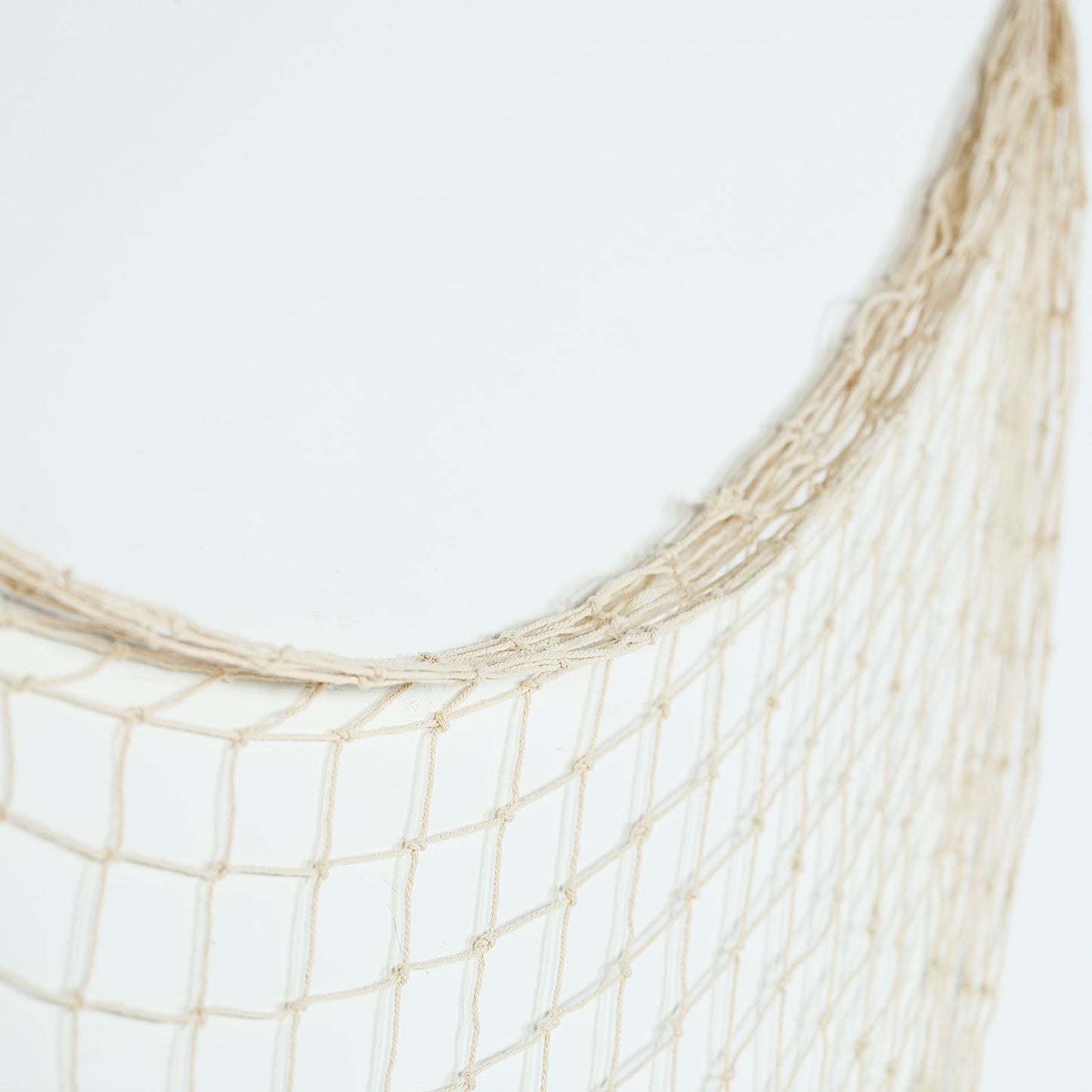 Natural cotton decorative fish net with ties, rustic beach decor.