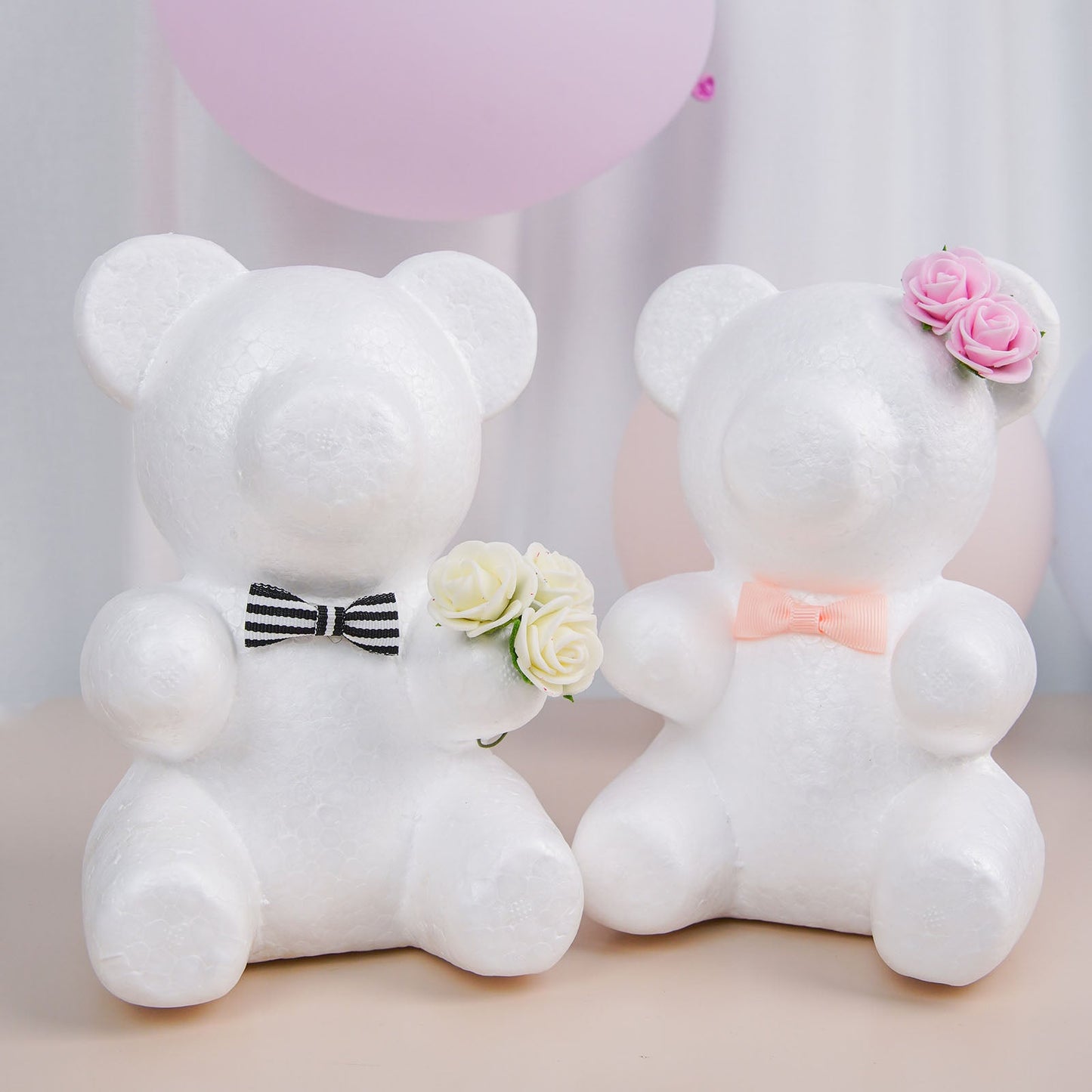 White 3D modeling styrofoam bears holding flowers, perfect for crafts.