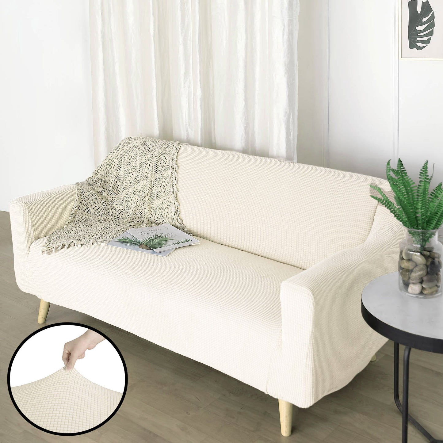 Ivory stretch loveseat sofa slipcover with fitted design and textured fabric.