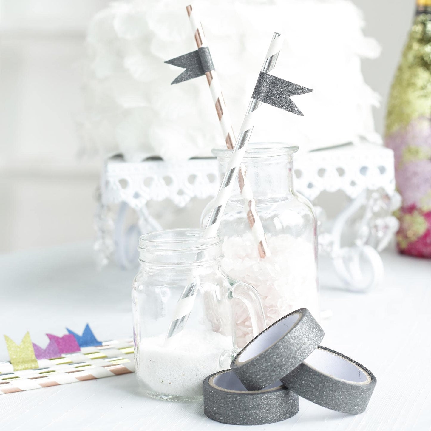 Charcoal gray glitter washi tape with decorative straws and jars.