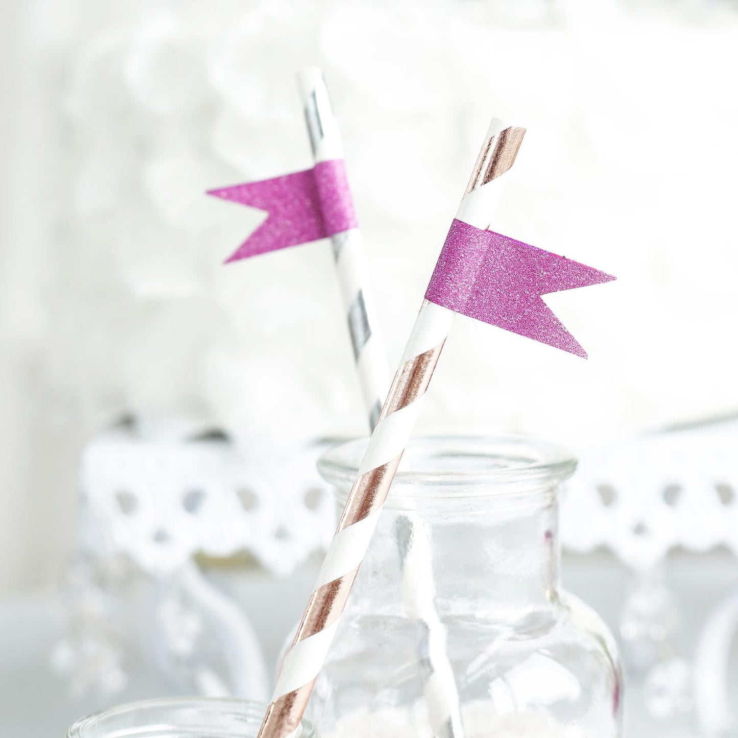 Hot pink glitter washi tape on decorative straws.