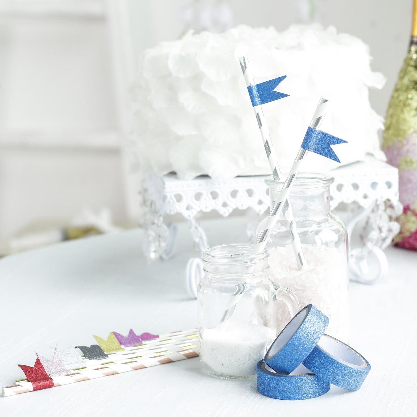 Royal blue glitter washi tape in a craft arrangement with decorative straws.