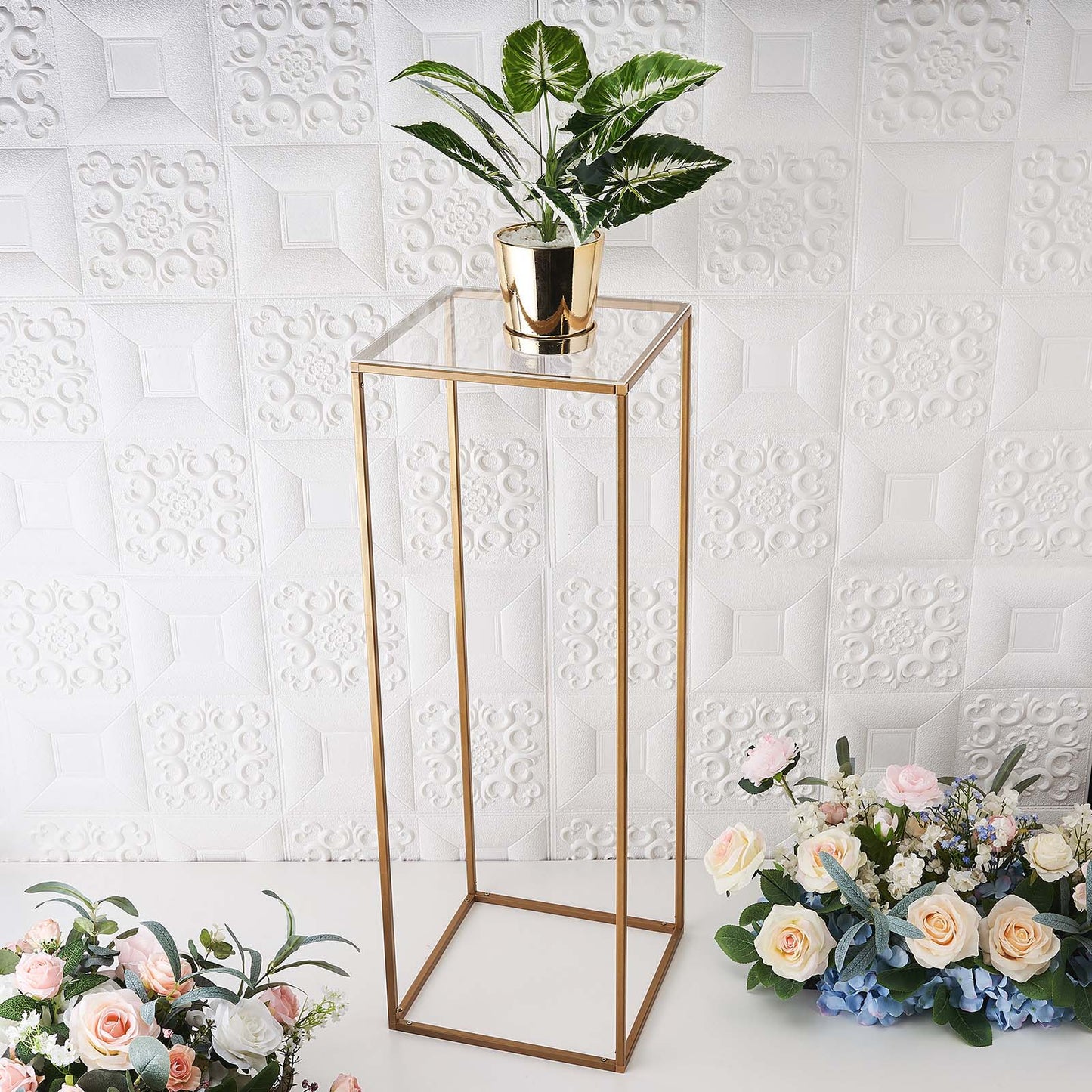 Clear acrylic plexiglass sheets on a display stand with flowers.