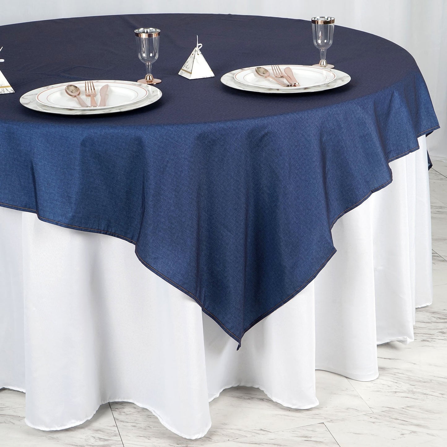 Dark denim blue table overlay for modern dining.