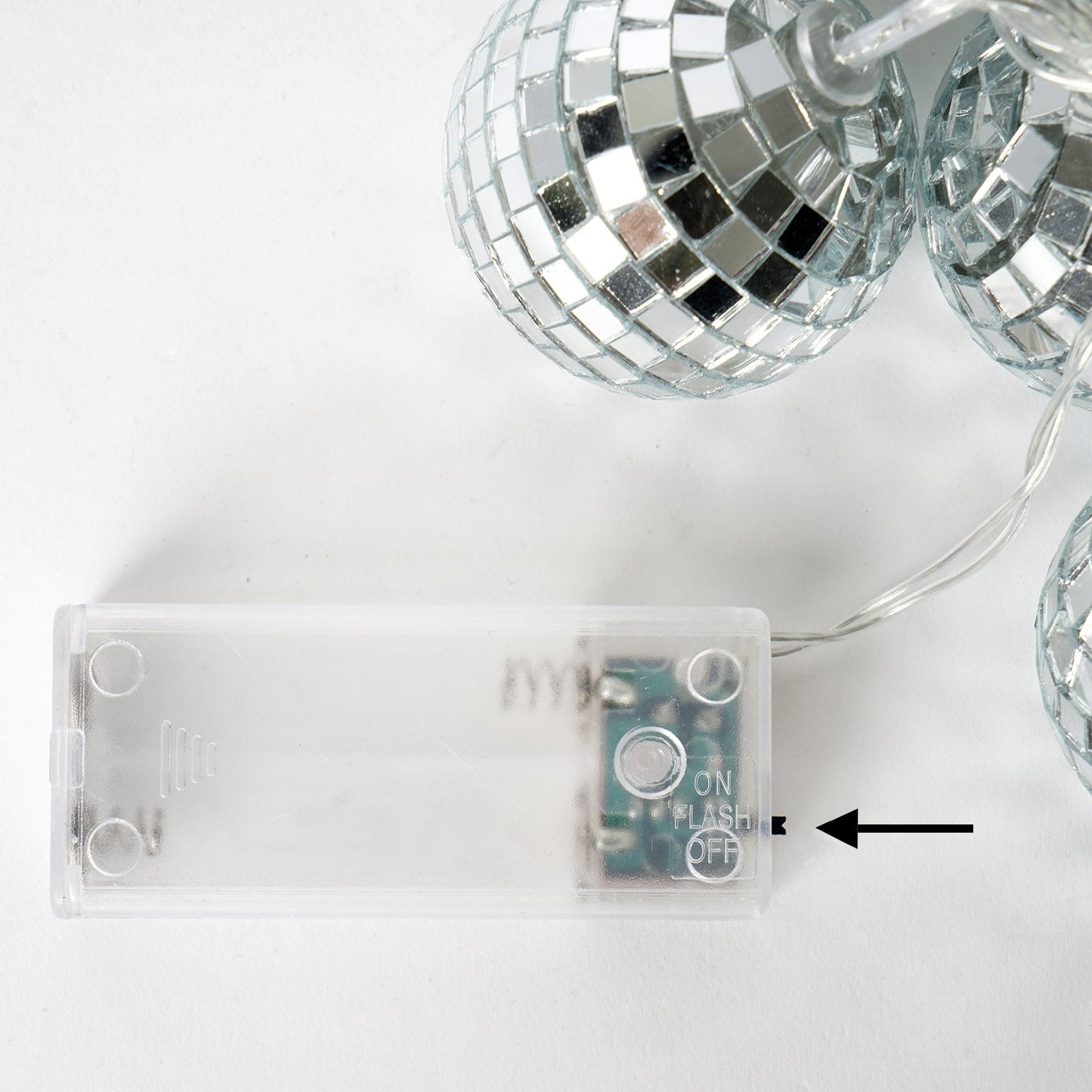 Silver disco mirror ball with LED string lights, battery-operated.