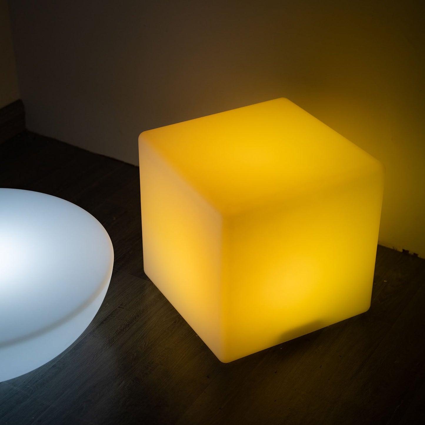 Yellow color changing LED light up cube table stool, rechargeable and waterproof.