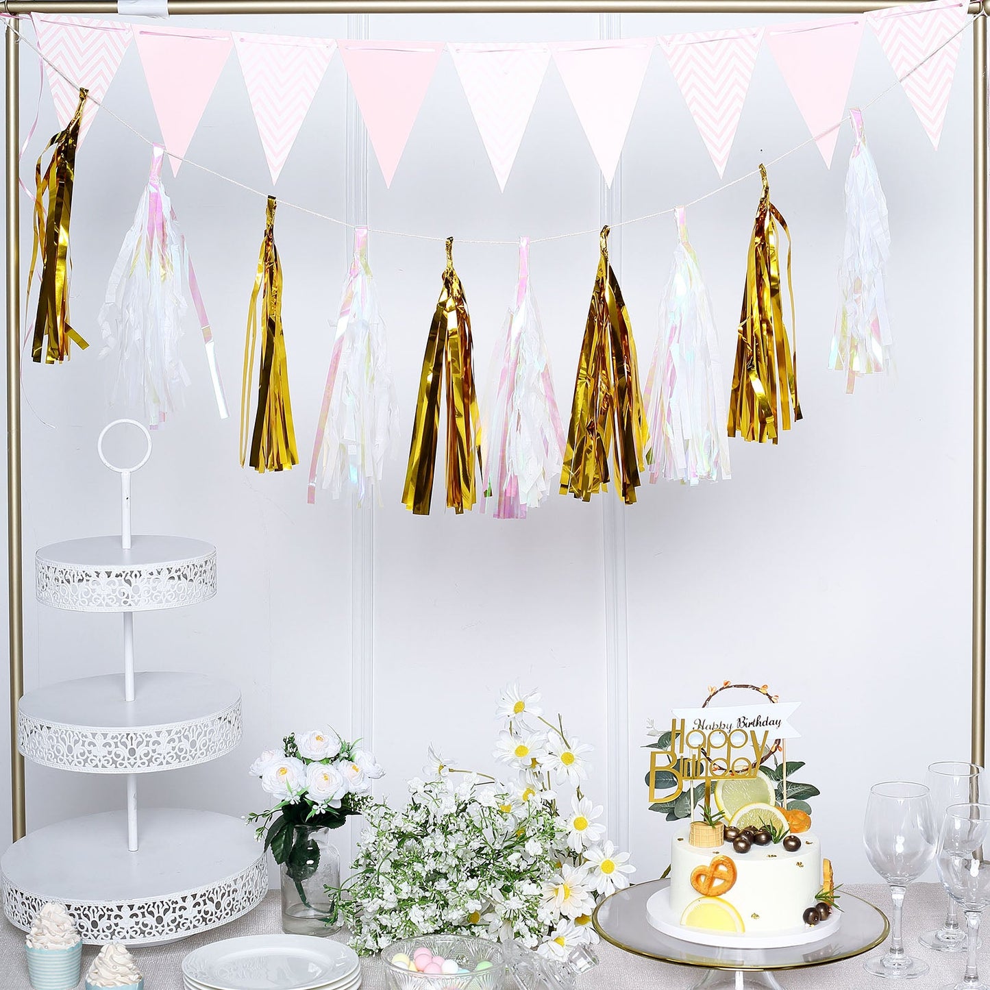Metallic gold foil tassels fringe garland for party decorations.