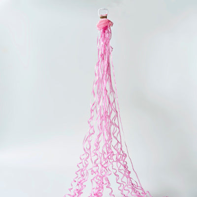 Vibrant Celebration with Pink Streamers Vibrant Celebration with Pink Streamers