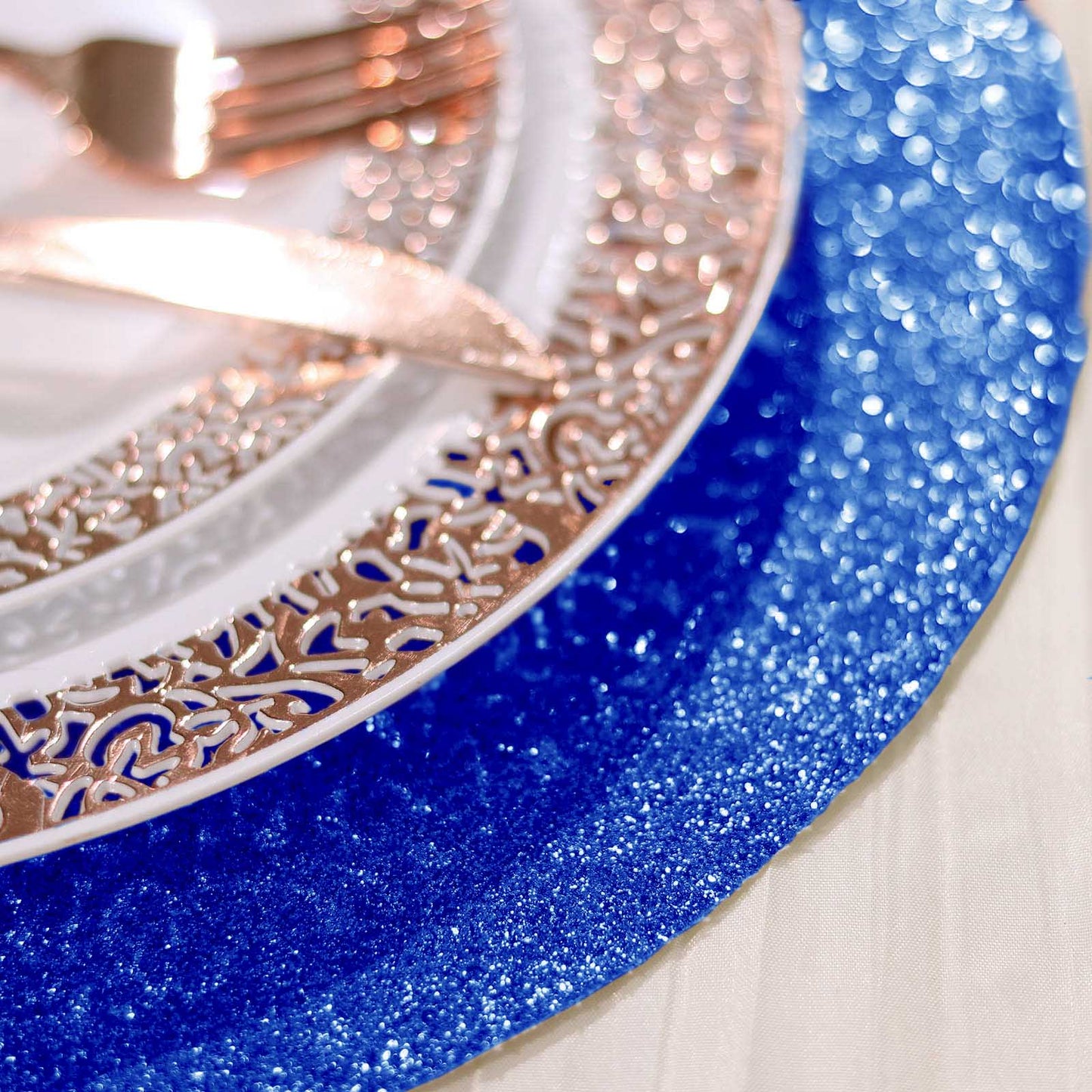 Royal blue sparkle vinyl placemats for decorative table settings.